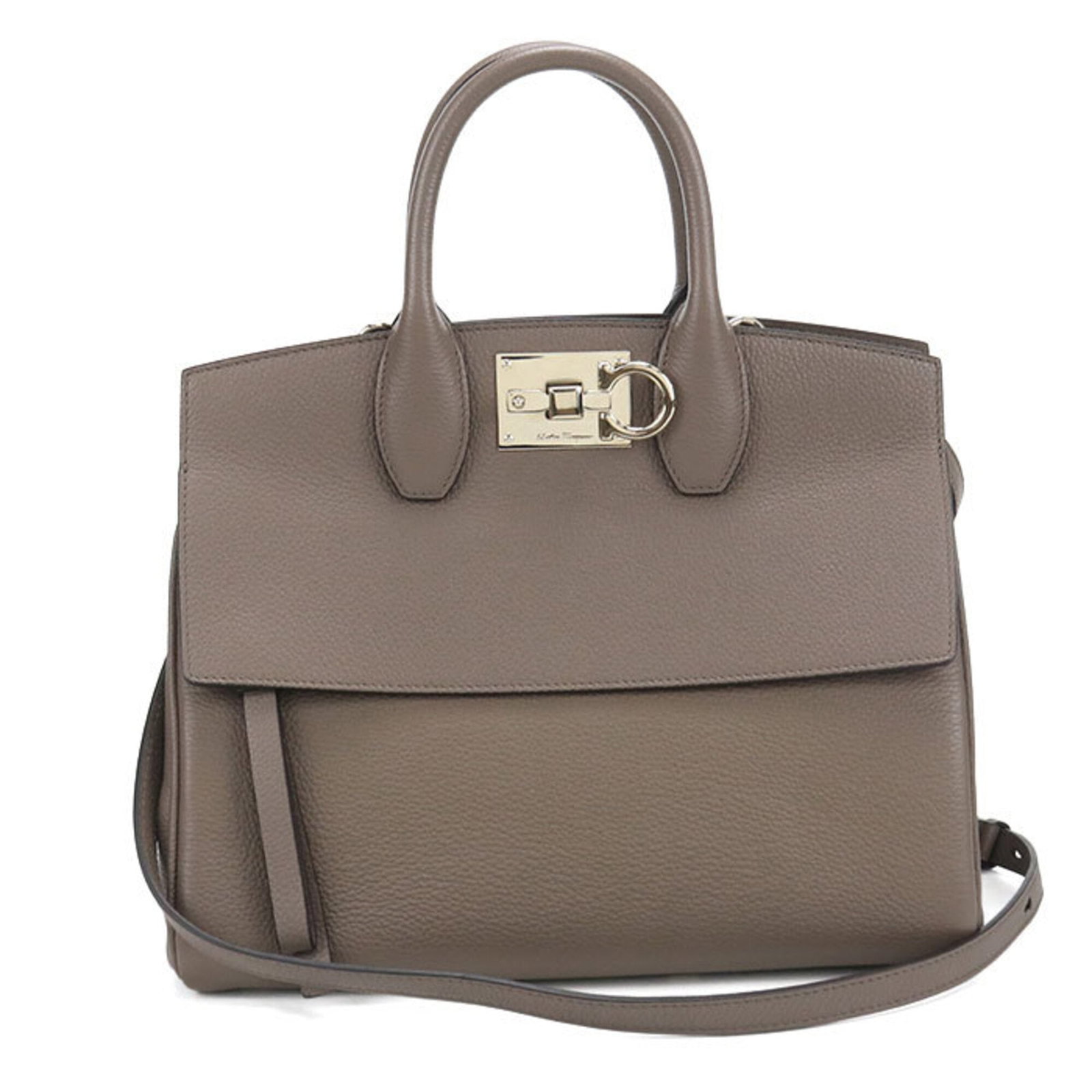 Salvatore Ferragamo Handbag Leather: Salvatore Ferragamo Handbag Leather Salvatore Ferragamo Handbag Leather features high-quality calfskin leather in a timeless gray color, adorned with gold hardware. This stylish handbag measures 24cm 