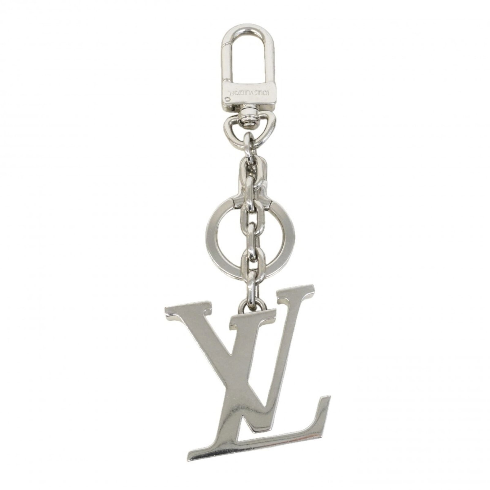 Louis Vuitton Keyring: Louis Vuitton Keyring Silver Louis Vuitton Keyring, measuring 13.5cm x 4.5cm x 5.00mm, features a sleek design with the iconic brand logo. The keyring's compact size and durable construction make it