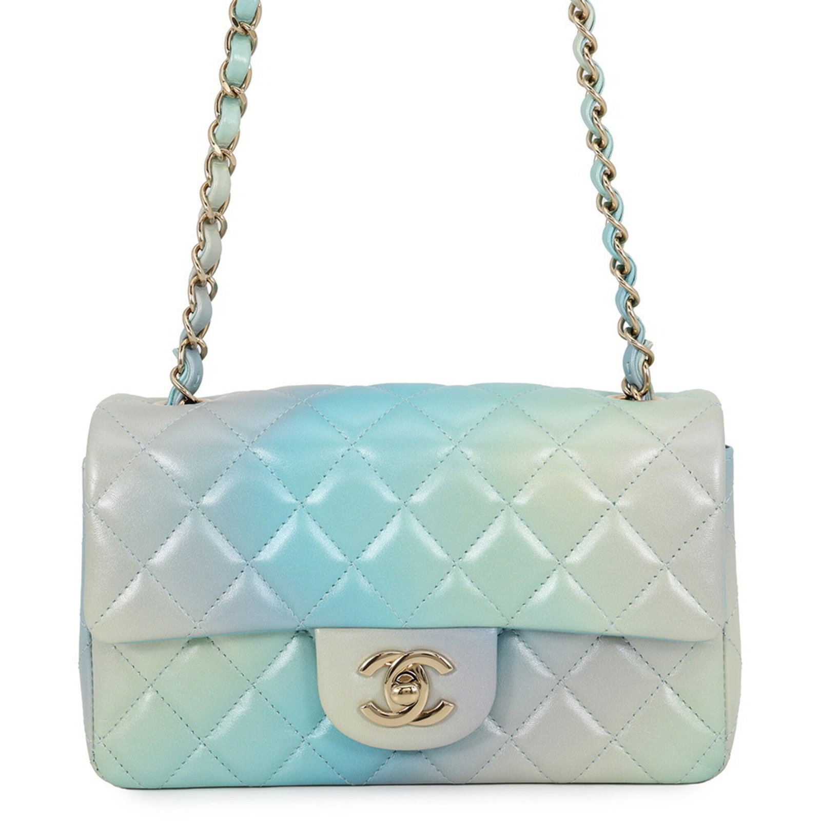 Chanel Handbag Shoulder Bag Leather: Chanel Handbag Shoulder Bag Leather Chanel's iconic shoulder bag features a stunning light blue and multi-color design, adorned with champagne gold hardware. Made from luxurious lambskin leather, the