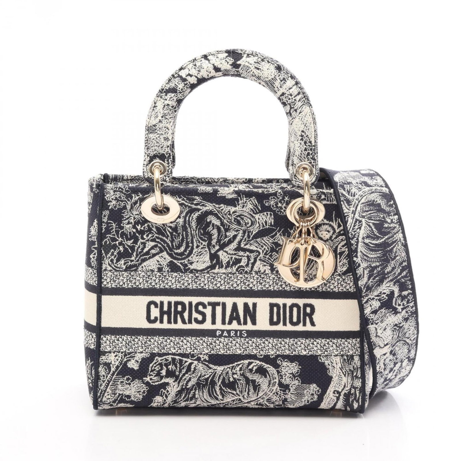 Canvas by Dior Christian: Canvas by Dior Christian Canvas by Dior Christian, a striking navy and white canvas handbag with clean lines and classic design. Measuring 19cm x 23cm x 11cm, it features a timeless silhouette that ex