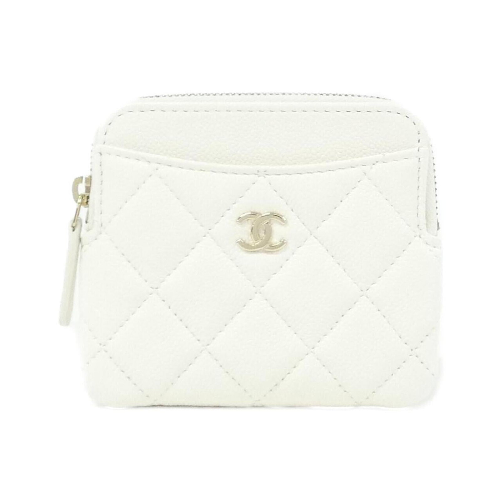 Chanel Coin Purse/ Coin Case Grained Calfskin: Chanel Coin Purse/ Coin Case Grained Calfskin The Chanel Coin Purse/ Coin Case Grained Calfskin features a sleek design made from high-quality grained calfskin, showcasing a classic white finish.