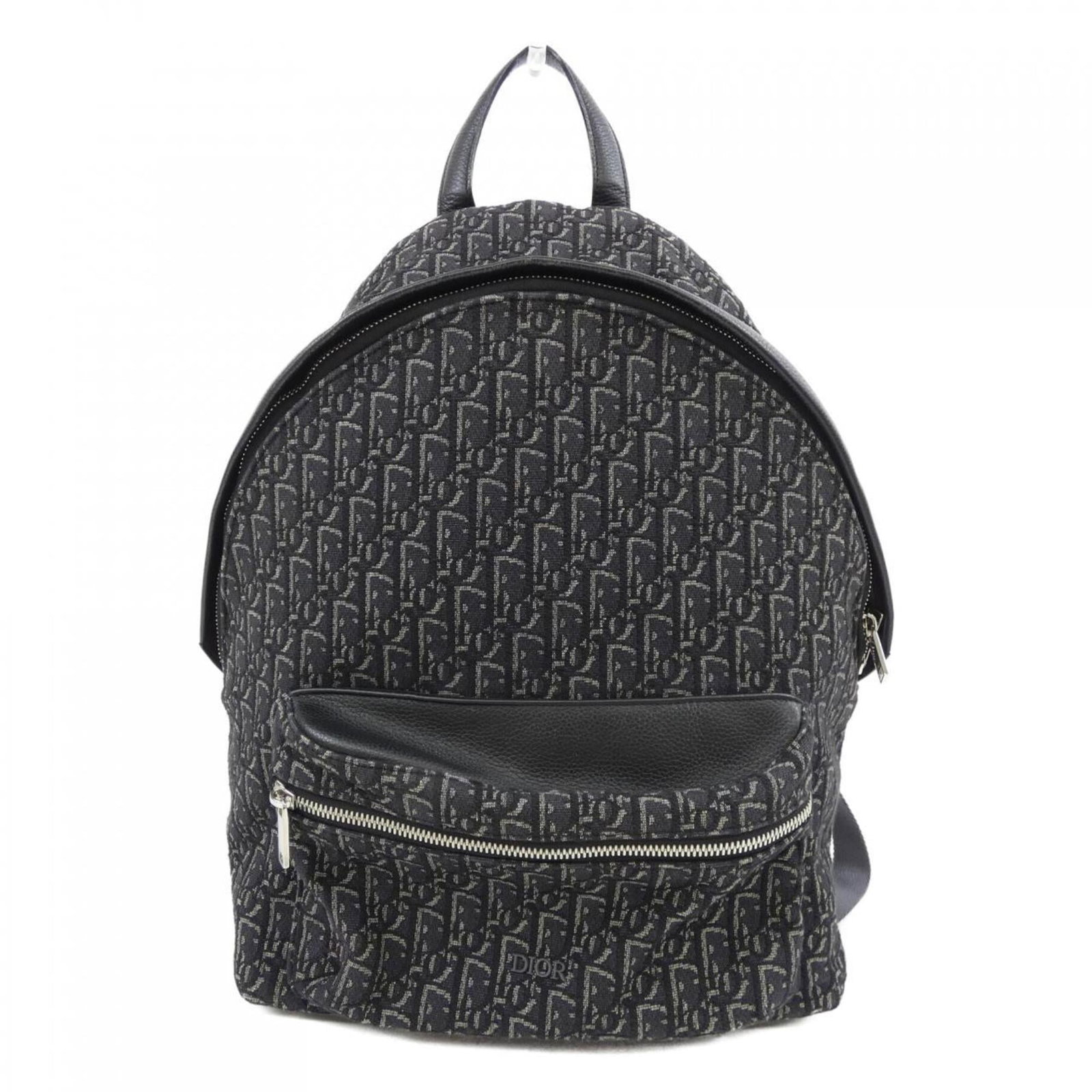 Christian Dior Backpack Handbag: Christian Dior Backpack Handbag Black and Gray Christian Dior Backpack Handbag for sale. This stylish backpack features a sleek black and gray design, measuring 43cm x 29cm x 14cm. Its compact size