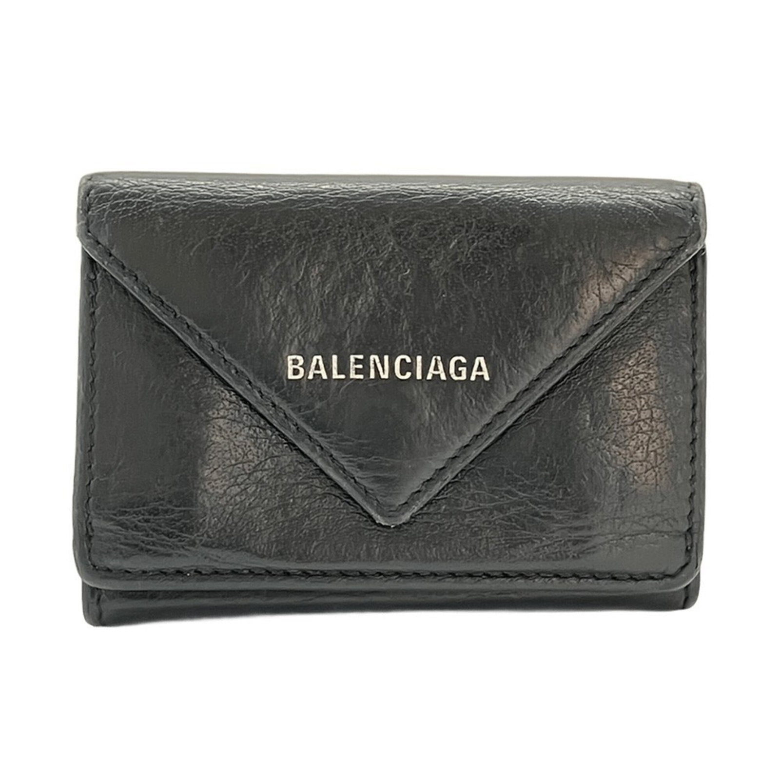 Balenciaga Wallet (Tri-Fold) Leather: Balenciaga Wallet (Tri-Fold) Leather Black tri-fold leather wallet from Balenciaga, measuring 6.5cm x 9.5cm x 2.5cm and weighing 68g. This sleek design features a durable black leather exterior with