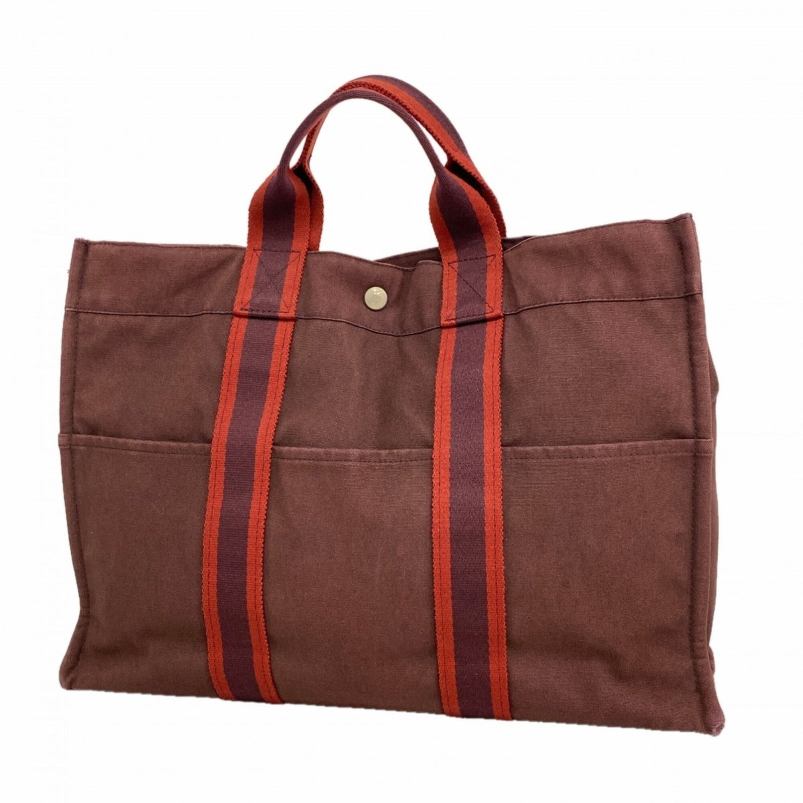 Canvas Hermes Tote Bag: Canvas Hermes Tote Bag Canvas Hermes Tote Bag - A Timeless Brown Classic. This iconic tote bag features high-quality canvas material, silver hardware, and a signature that bears the mark of the renown