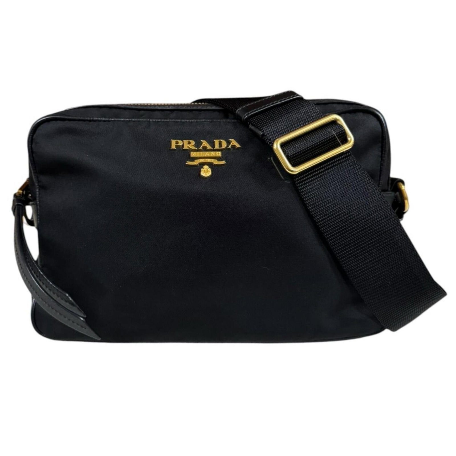 Shoulder Bag Nylon Prada: Shoulder Bag Nylon Prada Black Prada Country-Style Nylon Shoulder Bag with Gold Hardware and Zipper Closure. This stylish bag features a spacious interior with an inner zipper pocket, adjustable gold