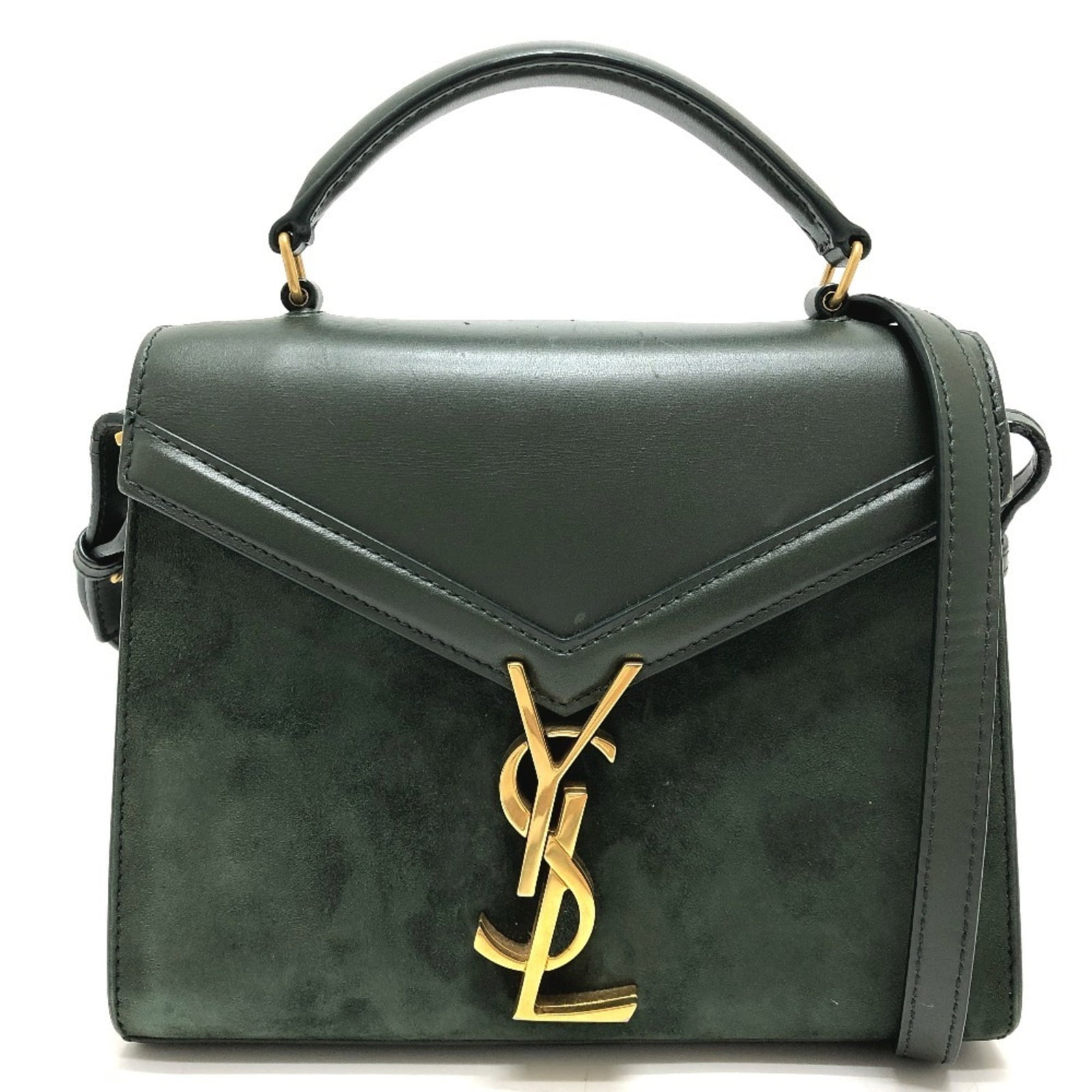 Saint Laurent Handbag Leather Suede: Saint Laurent Handbag Leather Suede This Saint Laurent Handbag features a unique combination of leather and suede materials, giving it a distinctive texture. Measuring 16cm x 20cm x 7cm, the bag's com