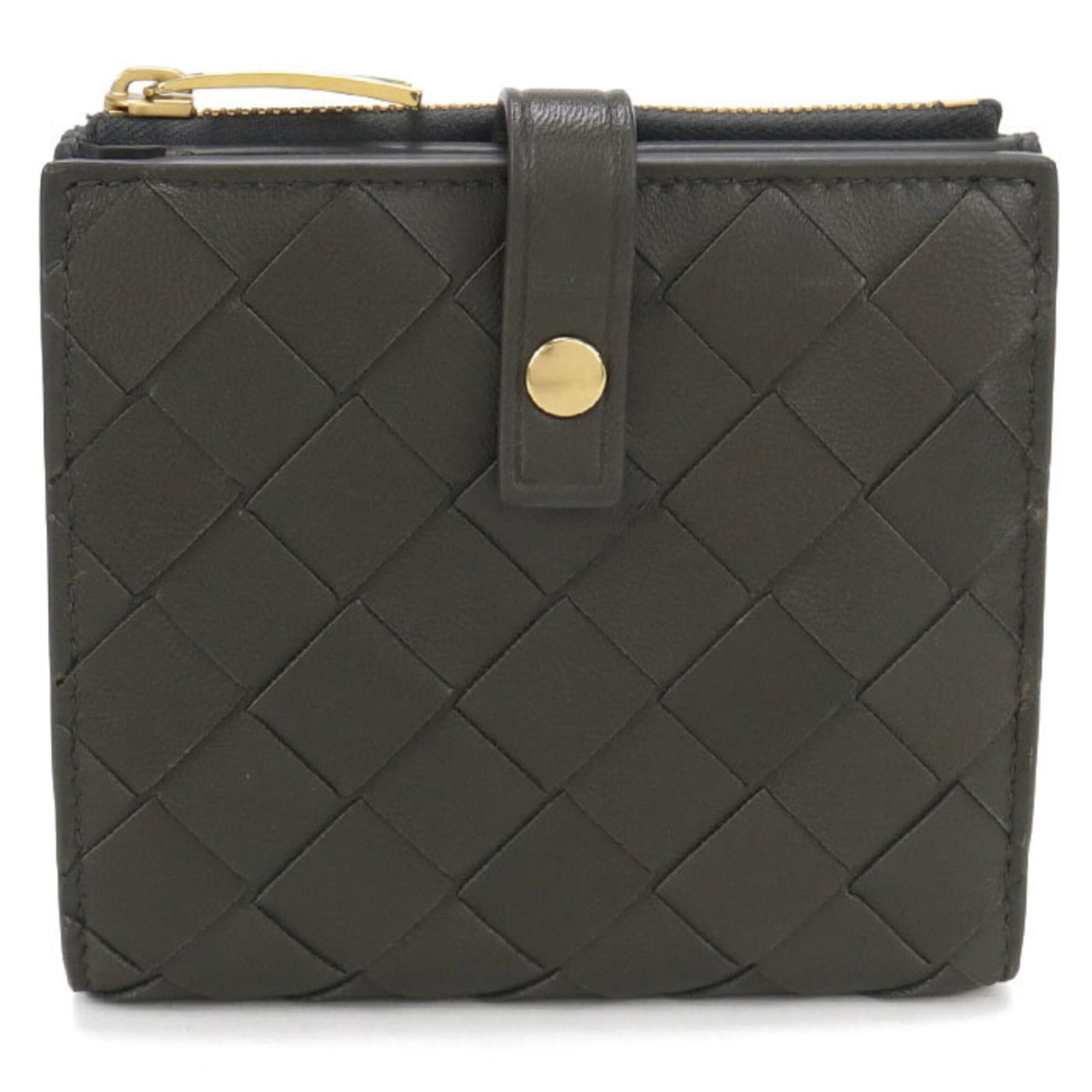 Veneta Bottega Bi Fold Leather Wallet: Veneta Bottega Bi Fold Leather Wallet The Veneta Bottega Bi Fold Leather Wallet boasts elegant design with its khaki lambskin exterior, showcasing the signature style of Italian luxury brand Bottega V