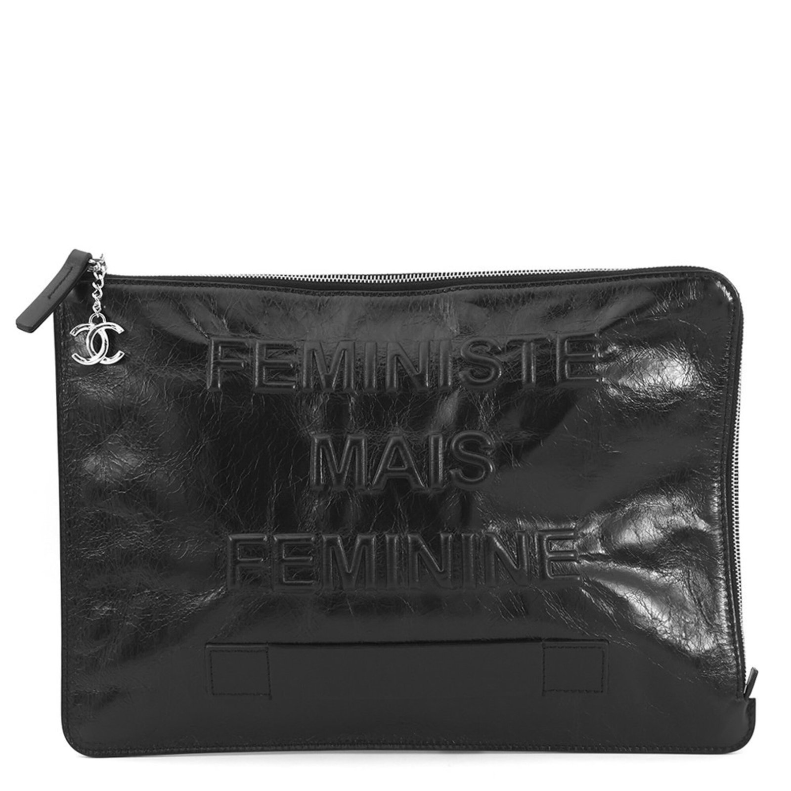 Clutch Bag Leather by Chanel: Clutch Bag Leather by Chanel Black leather clutch bag by Chanel, measuring 25.5cm x 36.5cm, made from high-quality materials and bearing a signature. This elegant accessory features a sleek design and