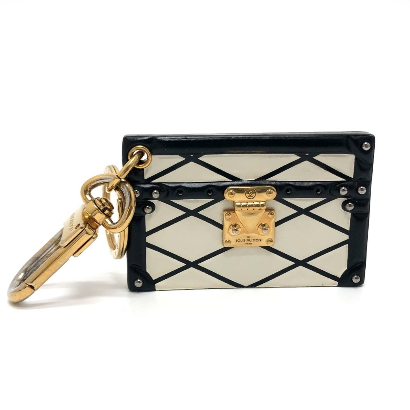 Louis Vuitton Keyring Leather Metal: Louis Vuitton Keyring Leather Metal Black, Gold, and White Louis Vuitton Keyring Leather Metal. This elegant keyring combines luxurious leather with sleek metal accents in three striking colors. The
