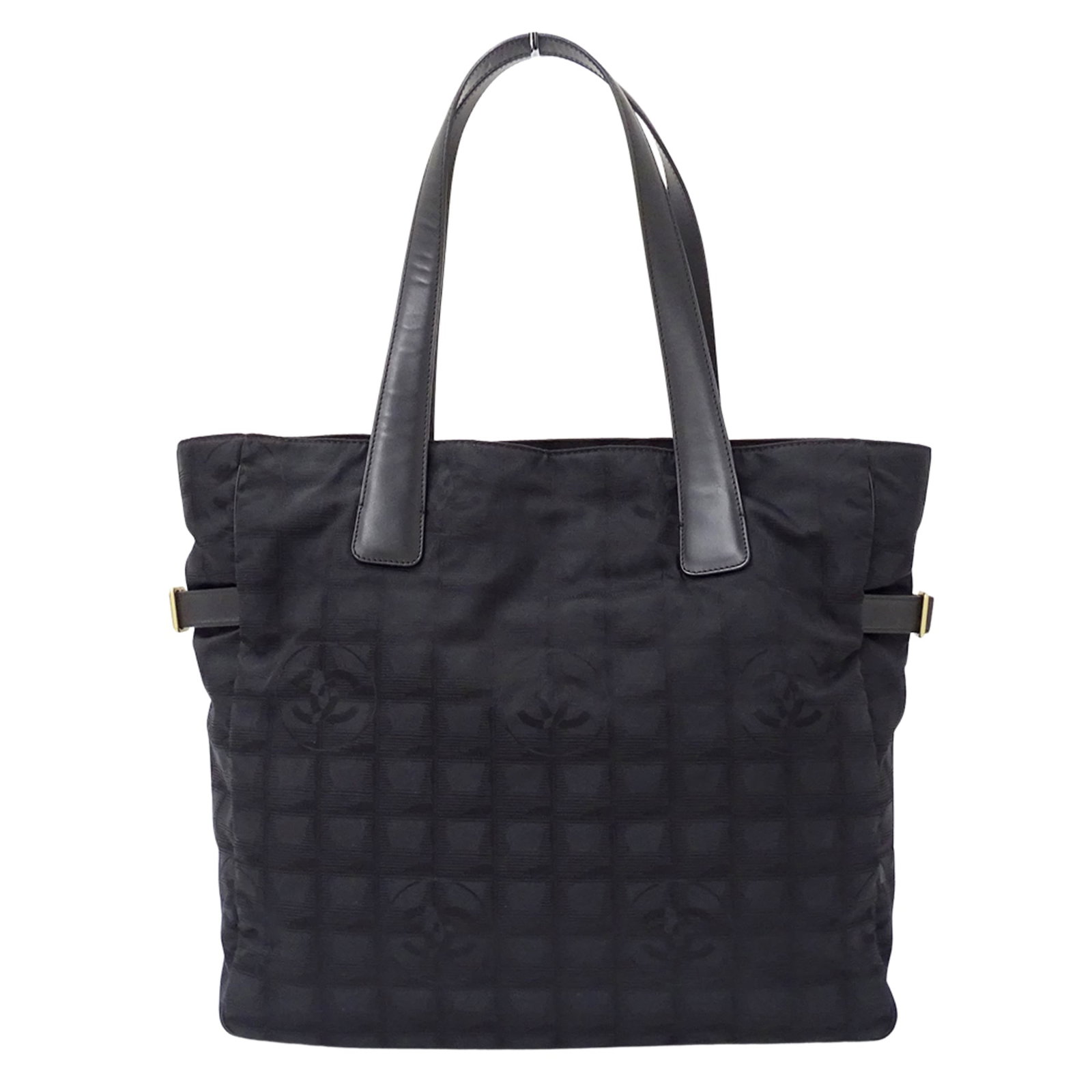 Nylon Chanel Handbag Tote: Nylon Chanel Handbag Tote Black nylon tote bag from Chanel, Italy, featuring gold hardware. The sleek design and durable nylon material make for a versatile and practical accessory. Measuring 33cm x 3