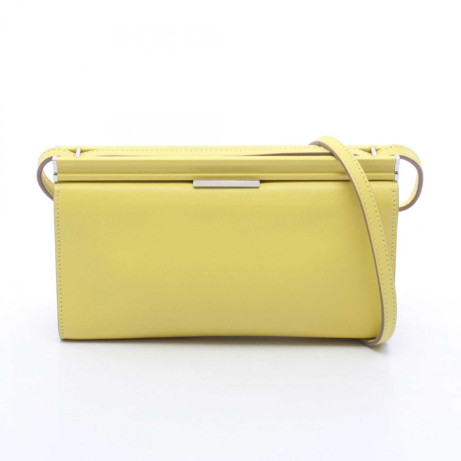 Hermes Handbag Leather Shoulder: Hermes Handbag Leather Shoulder This vibrant Lime, Yellow Hermes shoulder bag features sleek silver hardware and premium leather construction. Measuring just 12cm x 21cm x 4.5cm, it's a stylish access