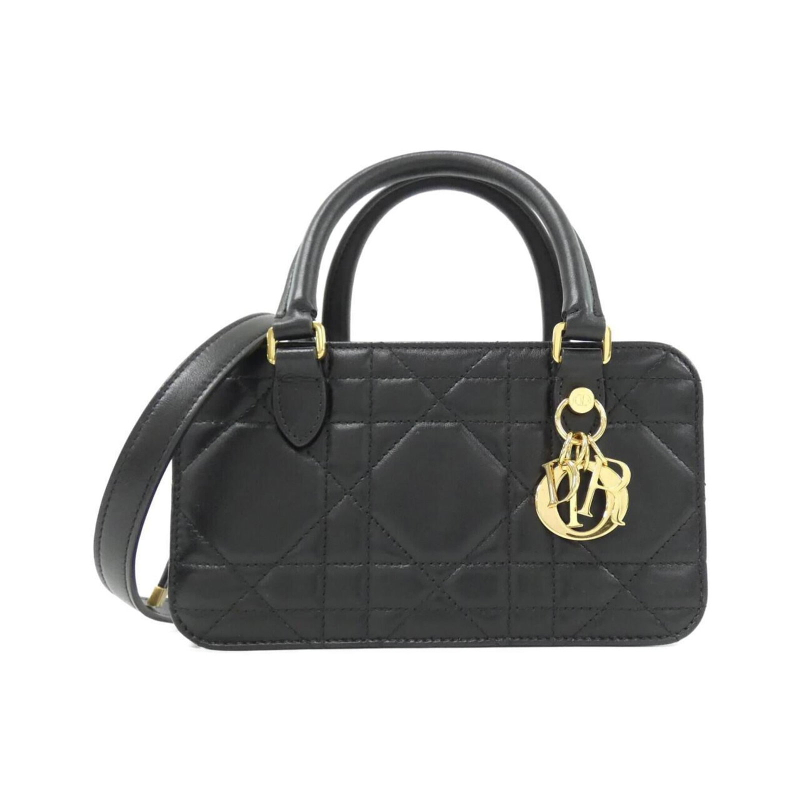Handbag Christian Dior Leather: Handbag Christian Dior Leather This black leather handbag from Christian Dior features a sleek design with precise measurements, standing at 11cm x 20cm x 8cm. The bag's classic style and durable cons