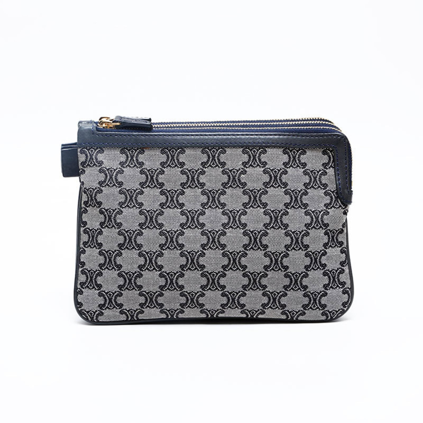 Celine Pouch: Celine Pouch Navy blue Celine pouch with clean lines and classic design, measuring 14cm x 20cm x 2.5cm. Made in Italy, this small leather bag features a simple yet elegant shape that fits perfectly in