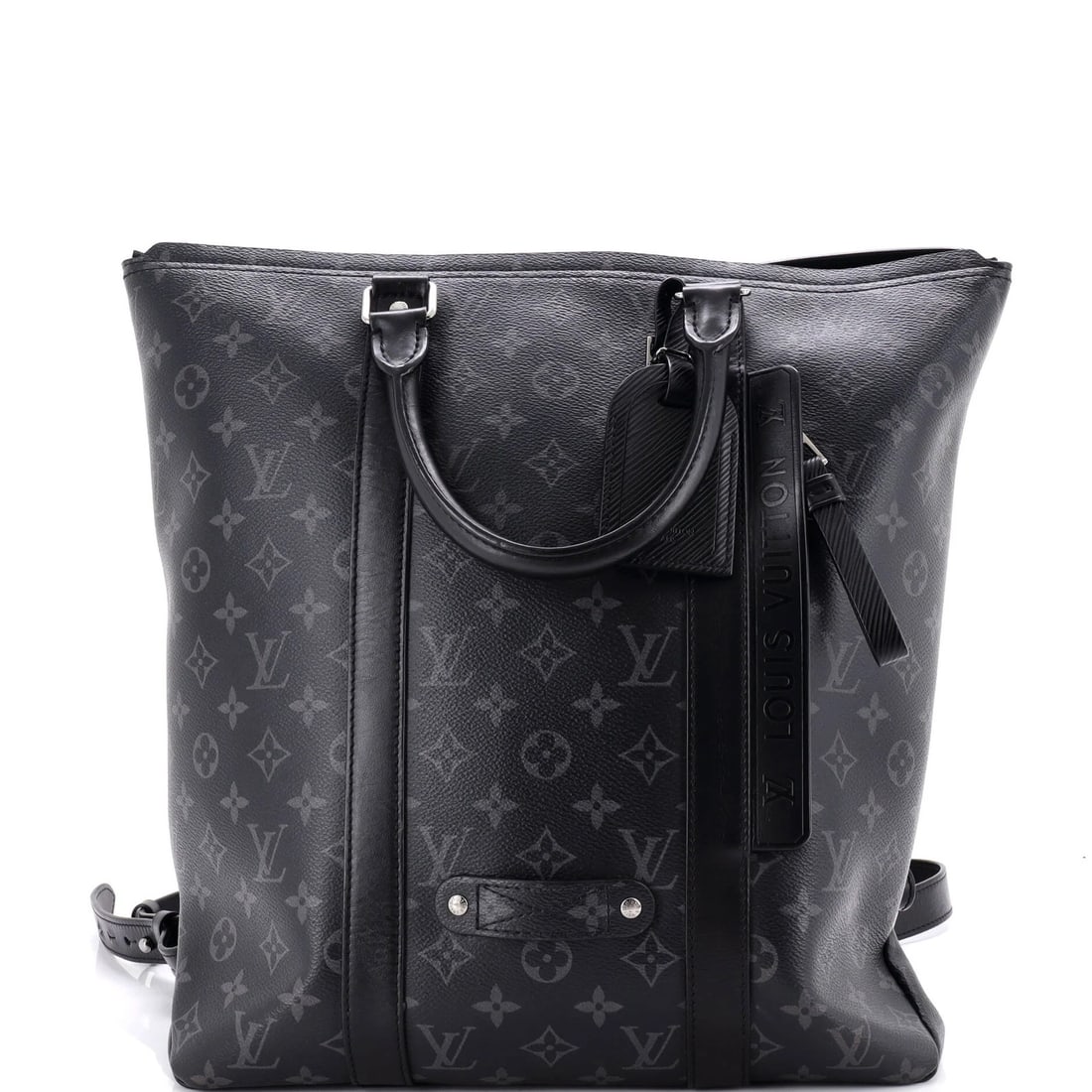 Louis Vuitton Monogram Eclipse Canvas Tote Backpack: Louis Vuitton Monogram Eclipse Canvas Tote Backpack Black canvas coated Louis Vuitton Monogram Eclipse tote backpack with silver hardware, featuring minor scuffs and creases. The exterior shows signs 