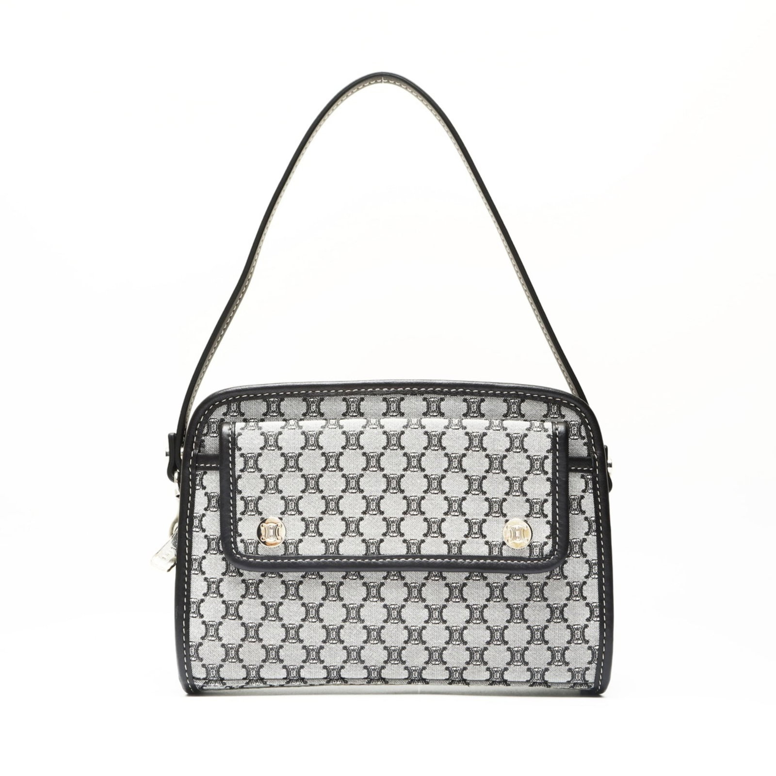 Handbag Canvas by Celine: Handbag Canvas by Celine Canvas by Celine offers a sleek, gray handbag with clean lines and a compact design. Measuring just 13cm x 19cm x 5cm, it features a sturdy canvas material and a 14cm drop