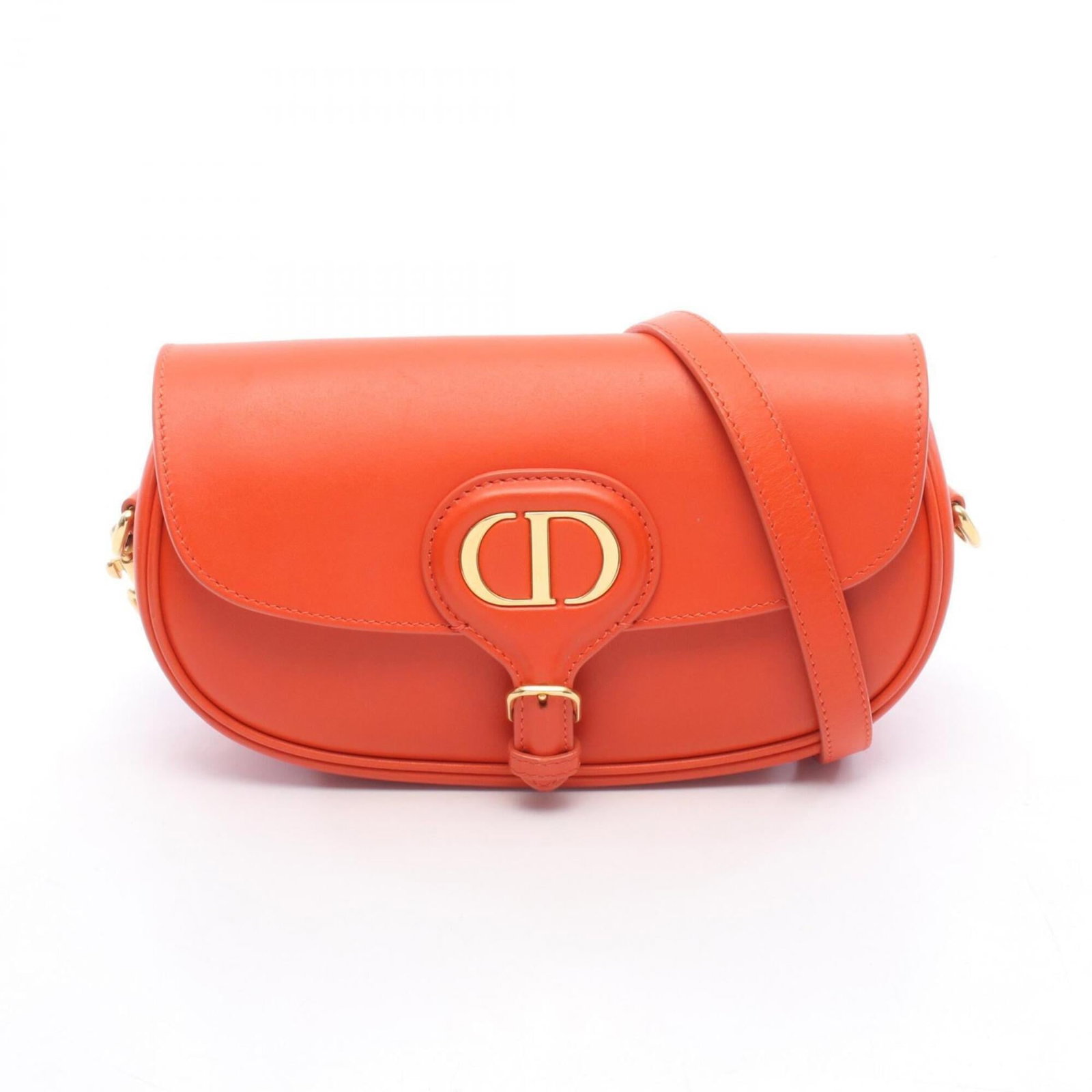 Shoulder bag leather by Christian Dior: Shoulder bag leather by Christian Dior This Christian Dior shoulder bag is crafted from high-quality leather, featuring a vibrant orange color. Measuring 13cm x 20.5cm x 5cm, it boasts a sleek and