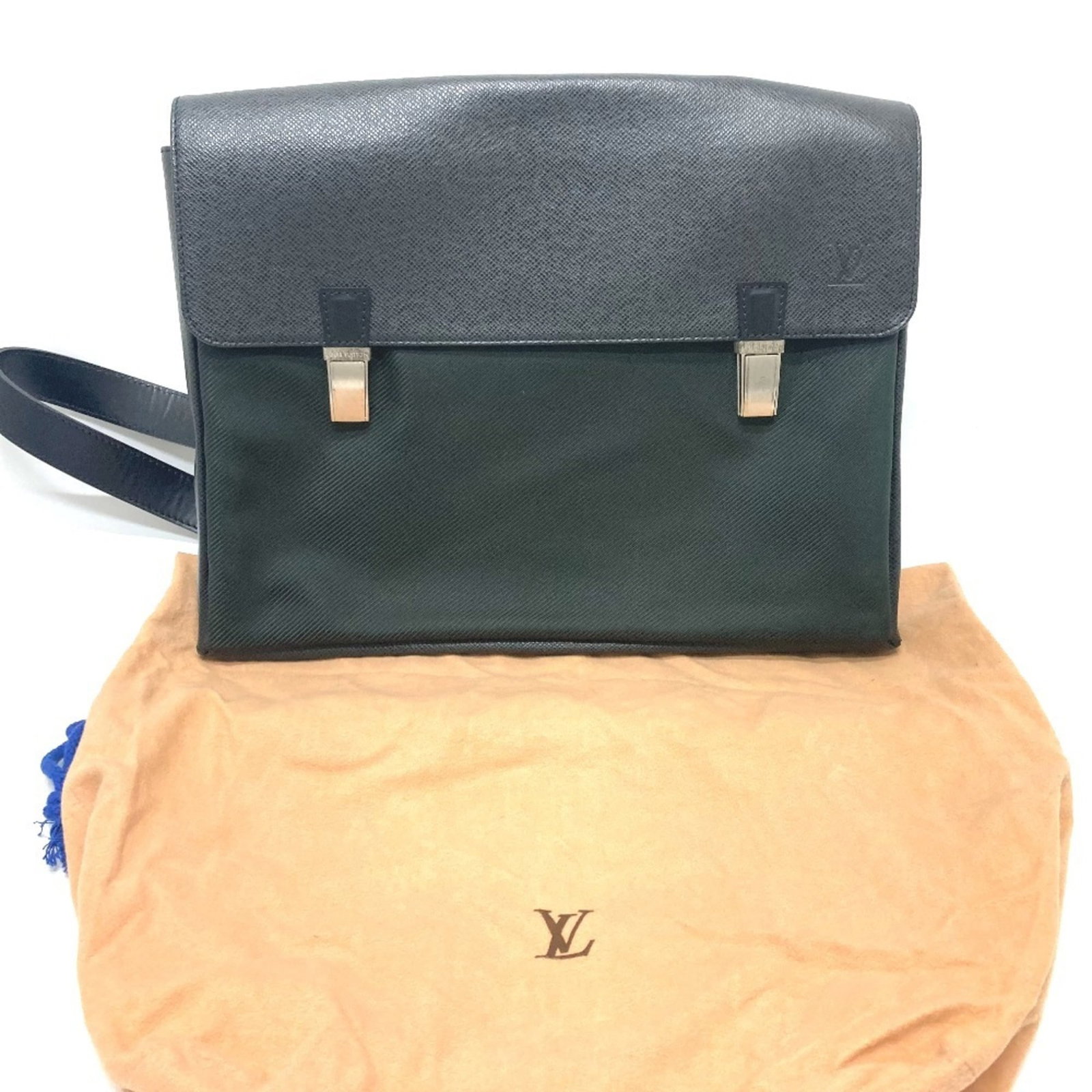 Taiga Leather Shoulder Bag by Louis Vuitton: Taiga Leather Shoulder Bag by Louis Vuitton Taiga Leather Shoulder Bag by Louis Vuitton boasts elegant design with Taiga leather material, showcasing the iconic Ardoise color. This stylish shoulder
