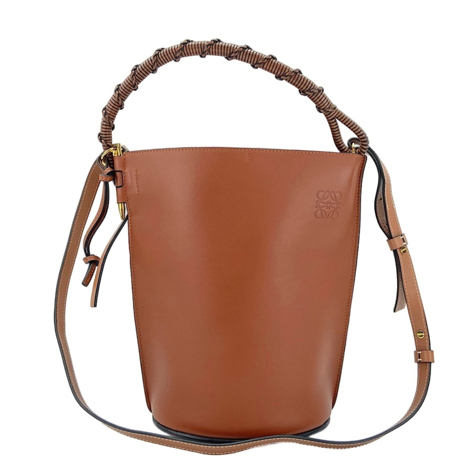 Shoulder Bag by Loewe: Shoulder Bag by Loewe The Loewe shoulder bag boasts a classic design with clean lines and a timeless brown hue. Measuring 28cm x 19cm x 14cm, it offers ample space for everyday essentials. Its