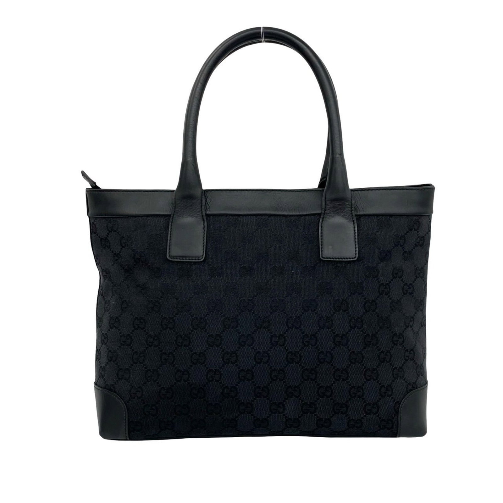 Canvas leather shoulder bag tote gucci handbag: Canvas leather shoulder bag tote gucci handbag Canvas and leather combine in sleek, modern design. The Gucci handbag features a black canvas exterior with leather accents, measuring 24cm x 37.5cm x
