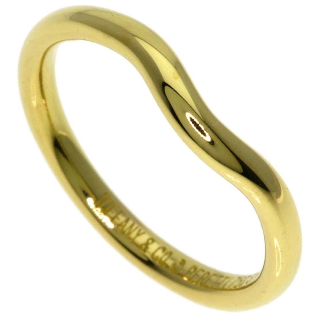 Tiffany&Co. Curved Band Ring K18 Yellow Gold: Tiffany&Co. Curved Band Ring K18 Yellow Gold Tiffany&Co.'s Curved Band Ring showcases elegant design in K18 Yellow Gold. This 18K yellow gold ring features a curved band with no stone, available in