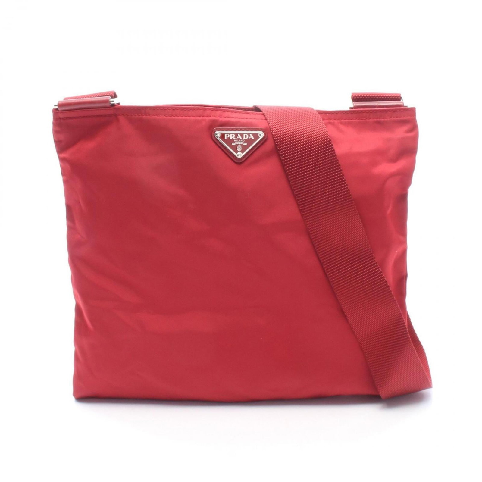 Nylon leather shoulder handbag by Prada: Nylon leather shoulder handbag by Prada Nylon leather shoulder handbag by Prada, featuring a striking red color and sleek design. Made from high-quality materials, this bag boasts a durable nylon