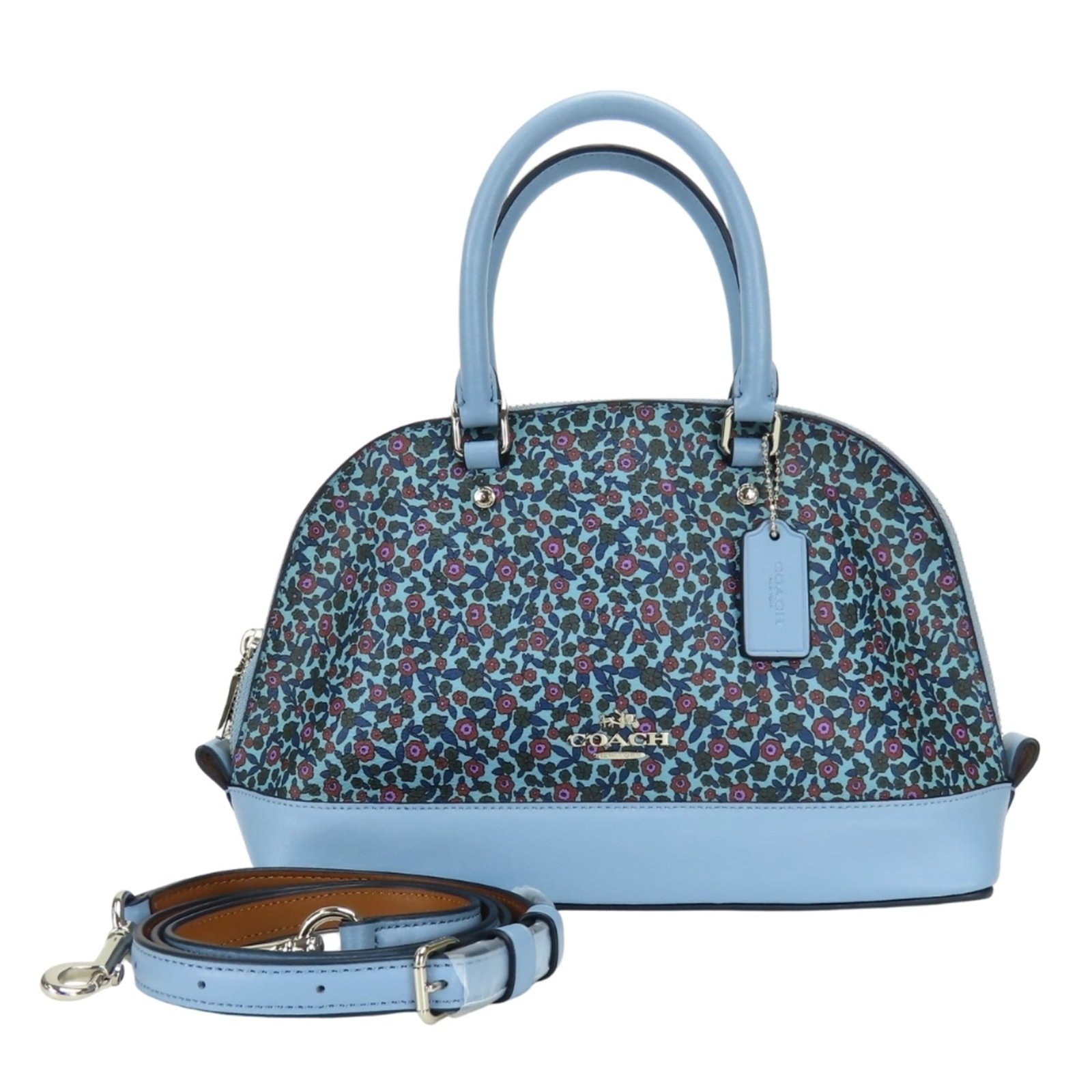 Coach Handbag Shoulder Bag Pvc Leather: Coach Handbag Shoulder Bag Pvc Leather This Coach shoulder bag features a unique combination of PVC and leather materials, presented in a striking blue color. The bag's sturdy design is complemented