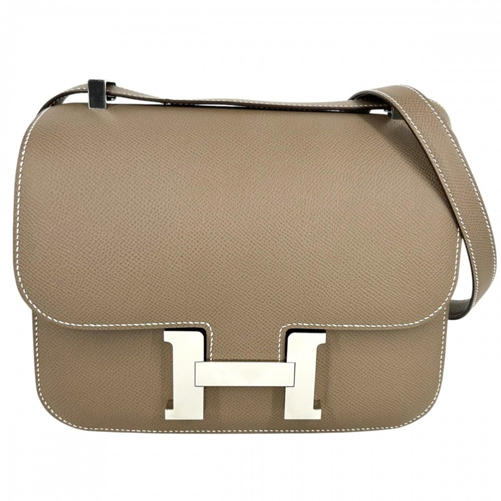 Epsom Leather Shoulder Bag By Hermes Pochette: Epsom Leather Shoulder Bag By Hermes Pochette Epsom leather shoulder bag by Hermes Pochette features etoupe gray color and measures 18cm x 23cm x 7cm. This stylish bag is made from high-quality Epsom