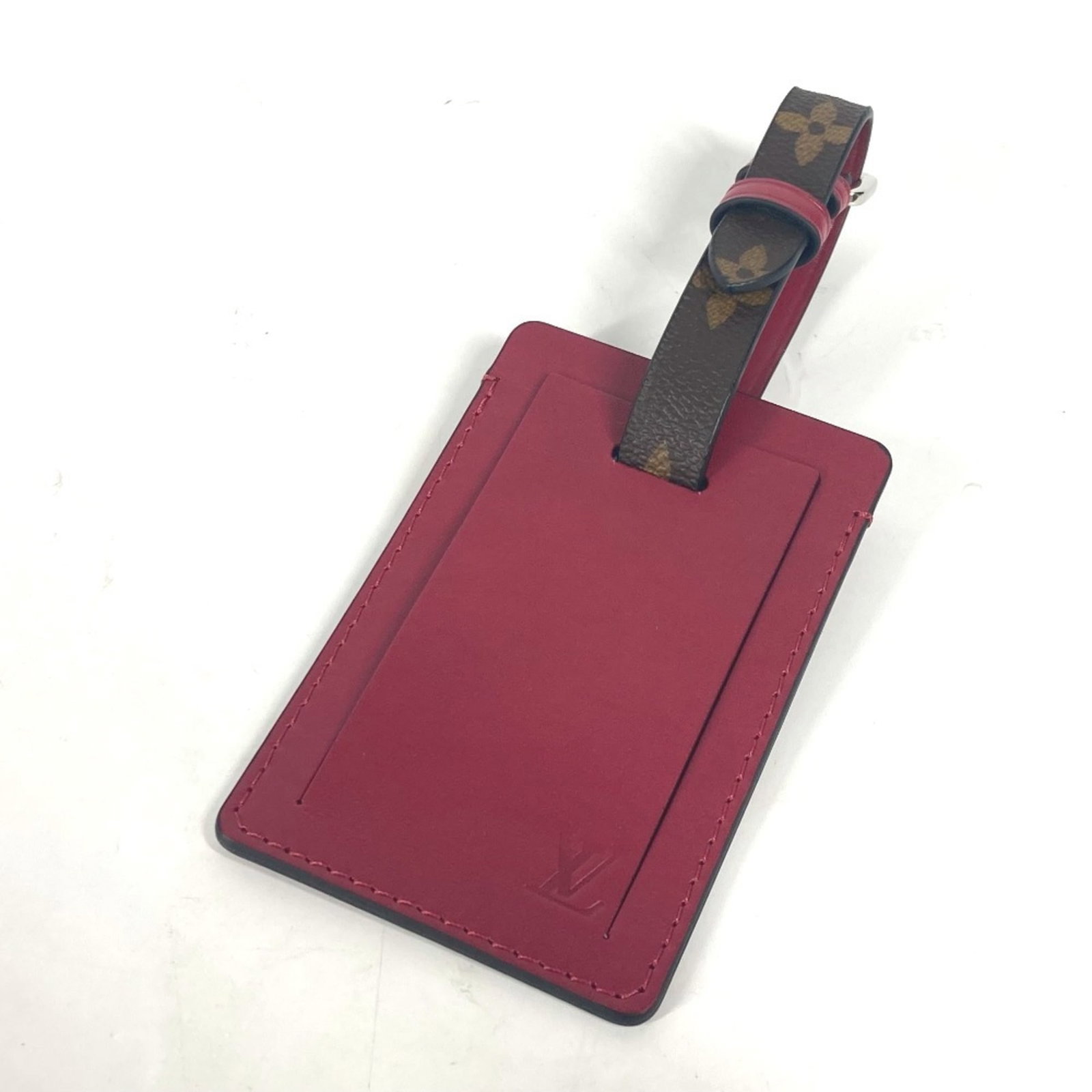 Name Tag Monogram Louis Vuitton: Name Tag Monogram Louis Vuitton Brown Louis Vuitton Monogram Name Tag with Box. This name tag features the iconic monogram pattern and has a brown color. It comes in a box for storage. Item Specifics: