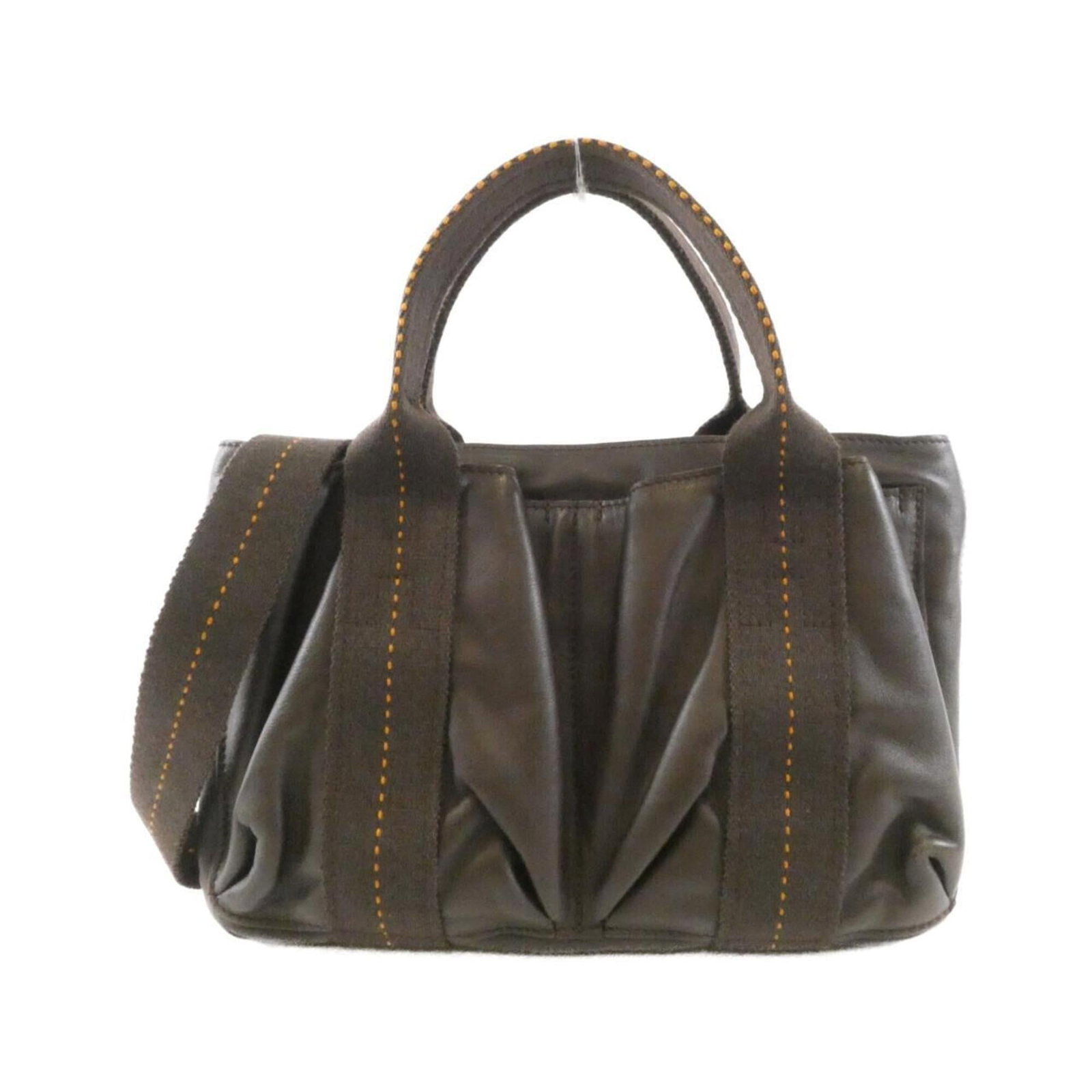 Handbag by Hermes: Handbag by Hermes Chocolat, a rich and sophisticated color, gives this Hermes handbag its distinctive charm. Measuring just 19cm x 27cm x 6cm, it's the perfect size for everyday use. With its classic