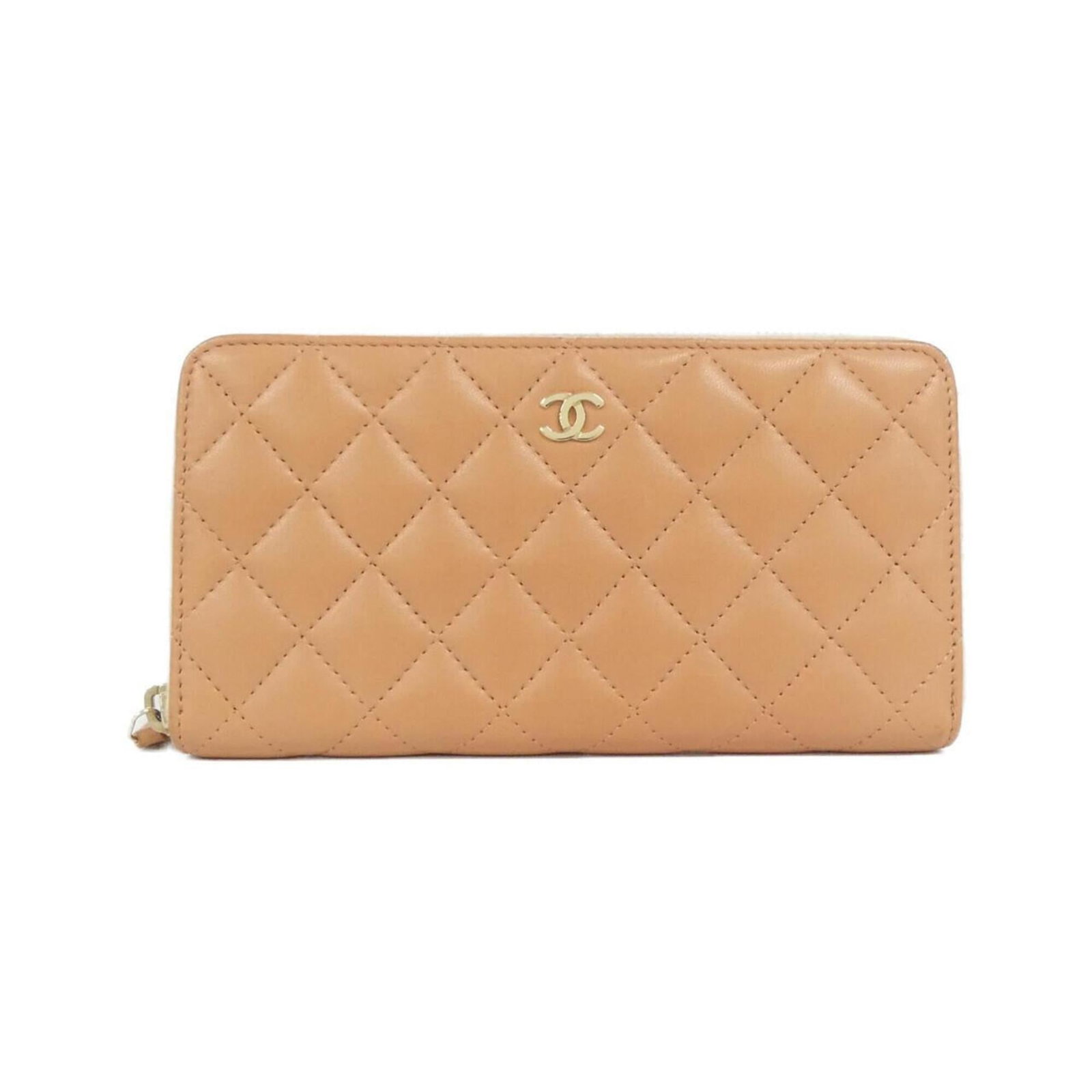 Chanel Long Wallet (Bi-Fold) Leather: Chanel Long Wallet (Bi-Fold) Leather Chanel's iconic long wallet, crafted from luxurious lambskin leather, boasts a sleek bi-fold design with precise measurements. Measuring 10.5cm x 19cm x 2cm, this