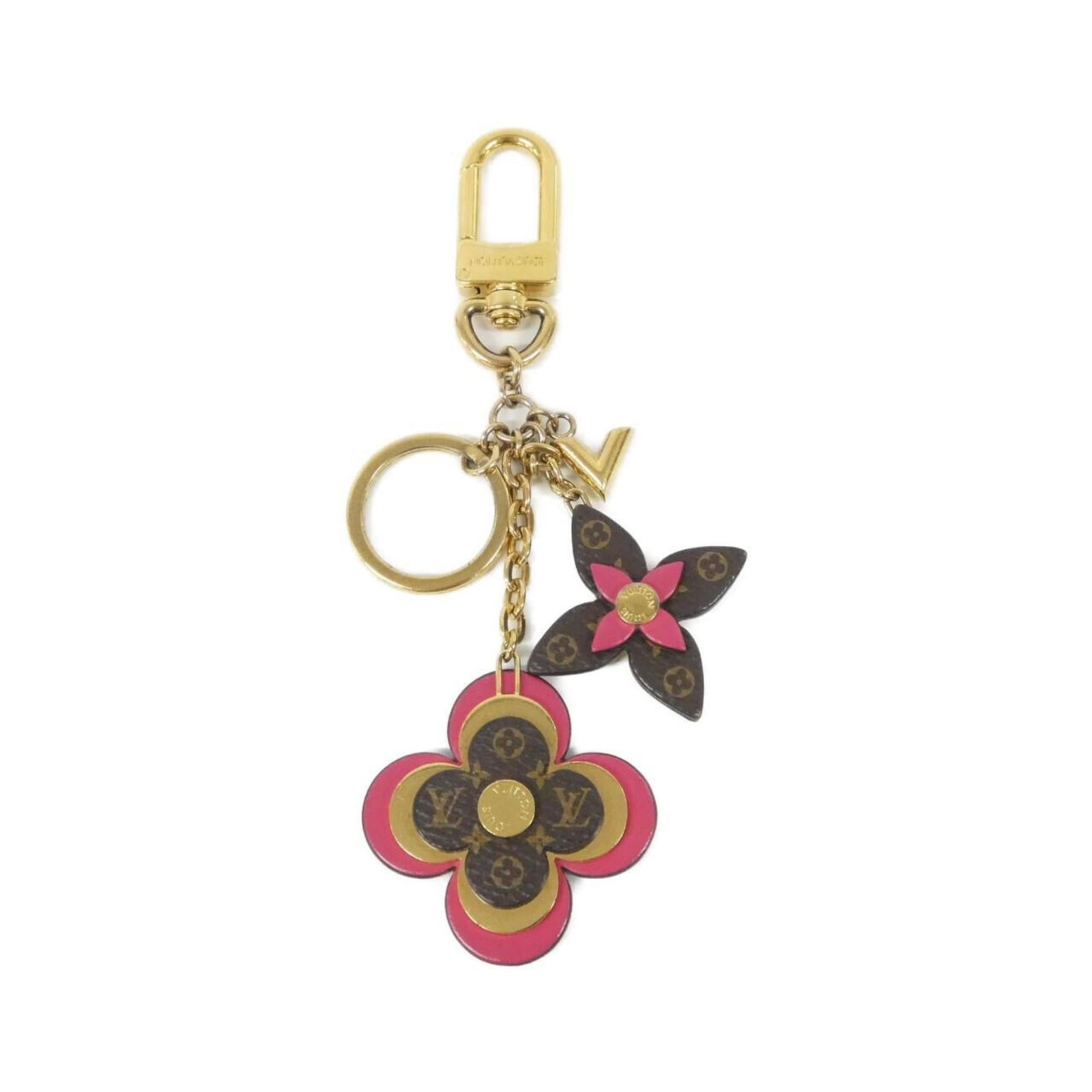 Louis Vuitton Keyring: Louis Vuitton Keyring Marron-colored keyring from Louis Vuitton, bearing the brand's signature style with its classic design and timeless elegance. This keyring is a stylish accessory that adds a