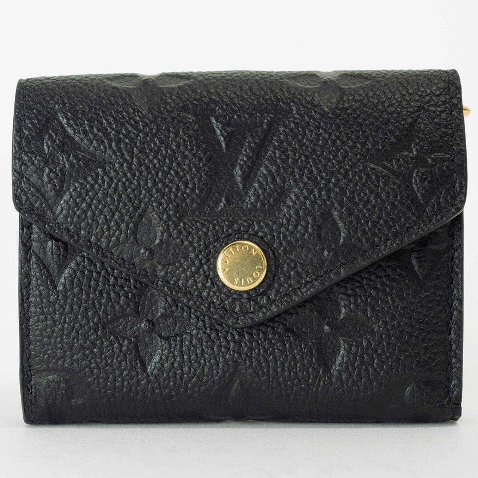 Louis Vuitton Wallet (Tri-Fold) Monogram Empreinte: Louis Vuitton Wallet (Tri-Fold) Monogram Empreinte Monogram Empreinte, the iconic Louis Vuitton design, adorns this tri-fold wallet. The Noir color adds a touch of sophistication to this stylish acces