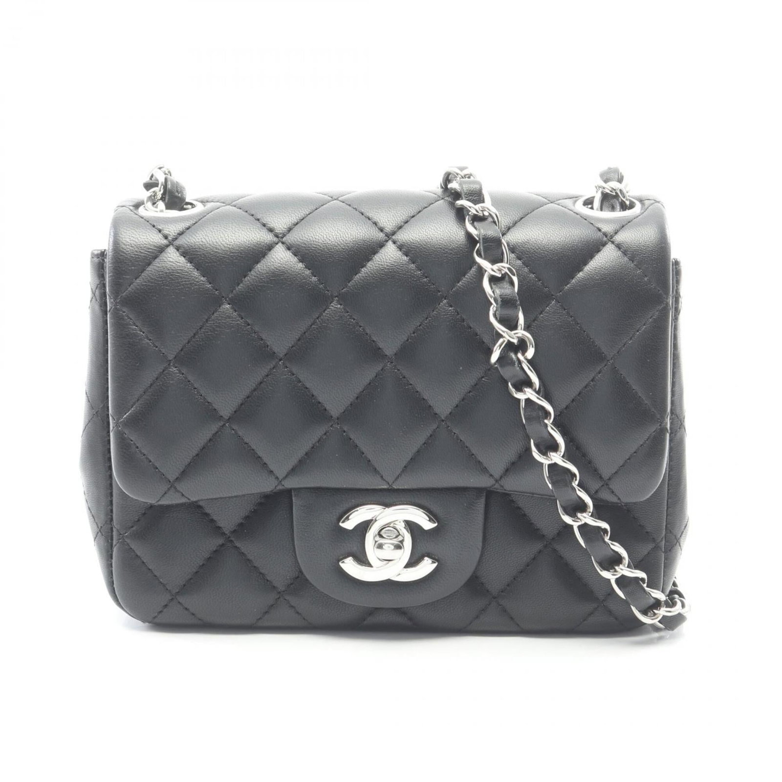 Chanel Handbag Shoulder Bag Leather: Chanel Handbag Shoulder Bag Leather Black lambskin Chanel shoulder bag with classic design, measuring 13cm x 17cm x 8cm. Made from high-quality leather, this timeless piece exudes elegance and sophist