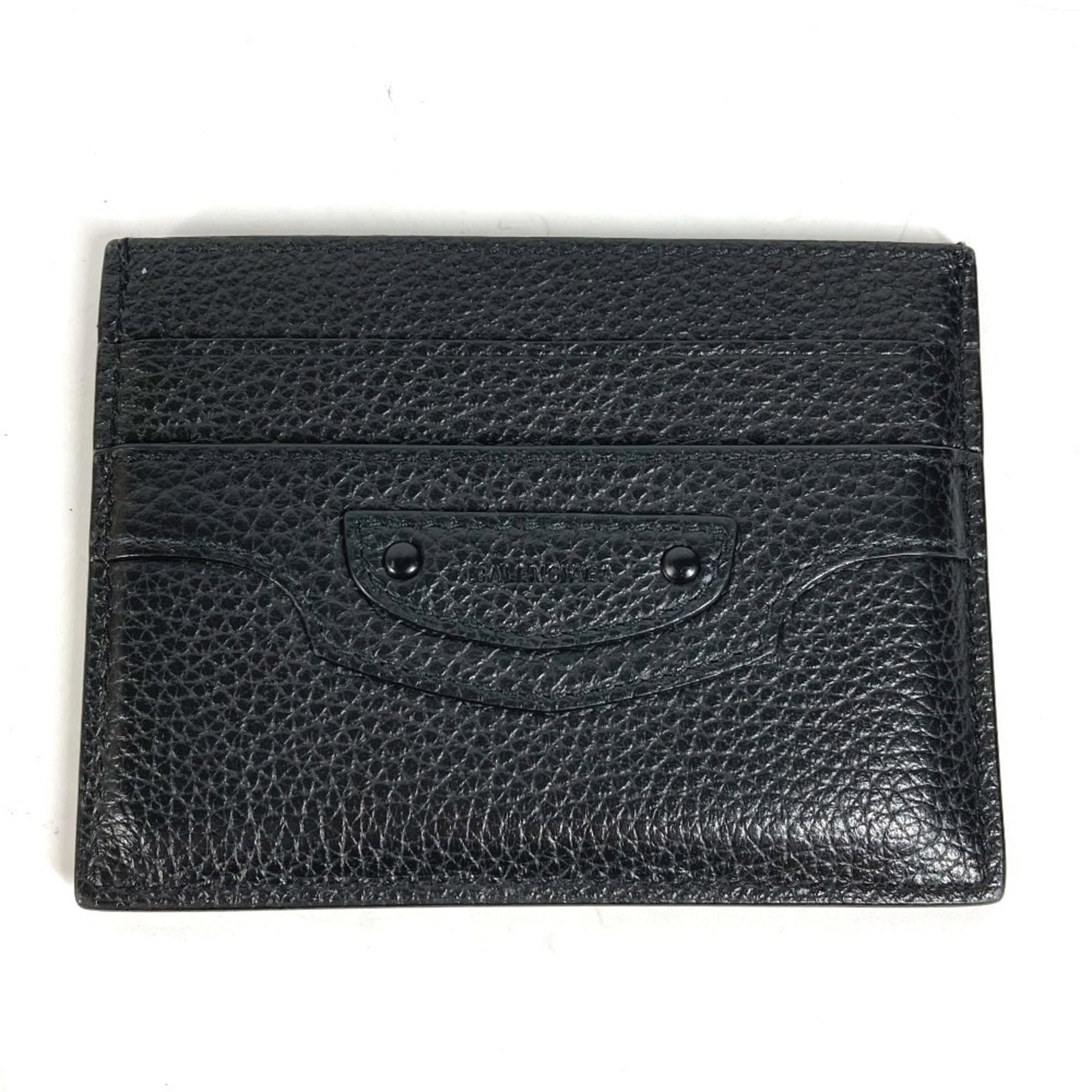 Business card case by Balenciaga: Business card case by Balenciaga Balenciaga business card case in sleek black, measuring 7.5cm x 10cm. Comes with a box and dust bag for added protection. A stylish accessory to complement your daily