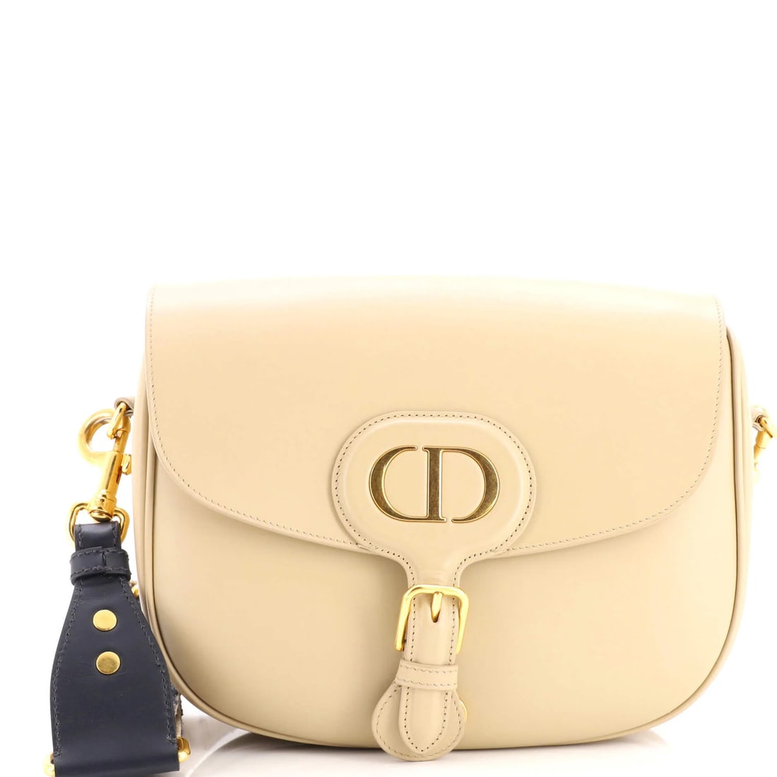 Dior Christian Bobby Leather Large Flap Bag: Dior Christian Bobby Leather Large Flap Bag The Dior Christian Bobby Leather Large Flap Bag boasts a neutral exterior with suede interior, gold hardware, and a spacious design. Measuring 7.5" tall,