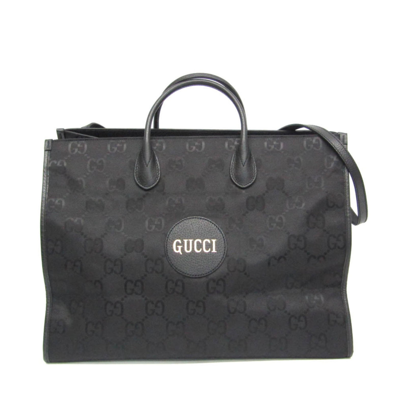 Nylon canvas handbag leather gucci bag shoulder: Nylon canvas handbag leather gucci bag shoulder Nylon canvas and leather Gucci bag, featuring an open design with a zipper pocket for added convenience. The Off the Grid GG model boasts a sleek black