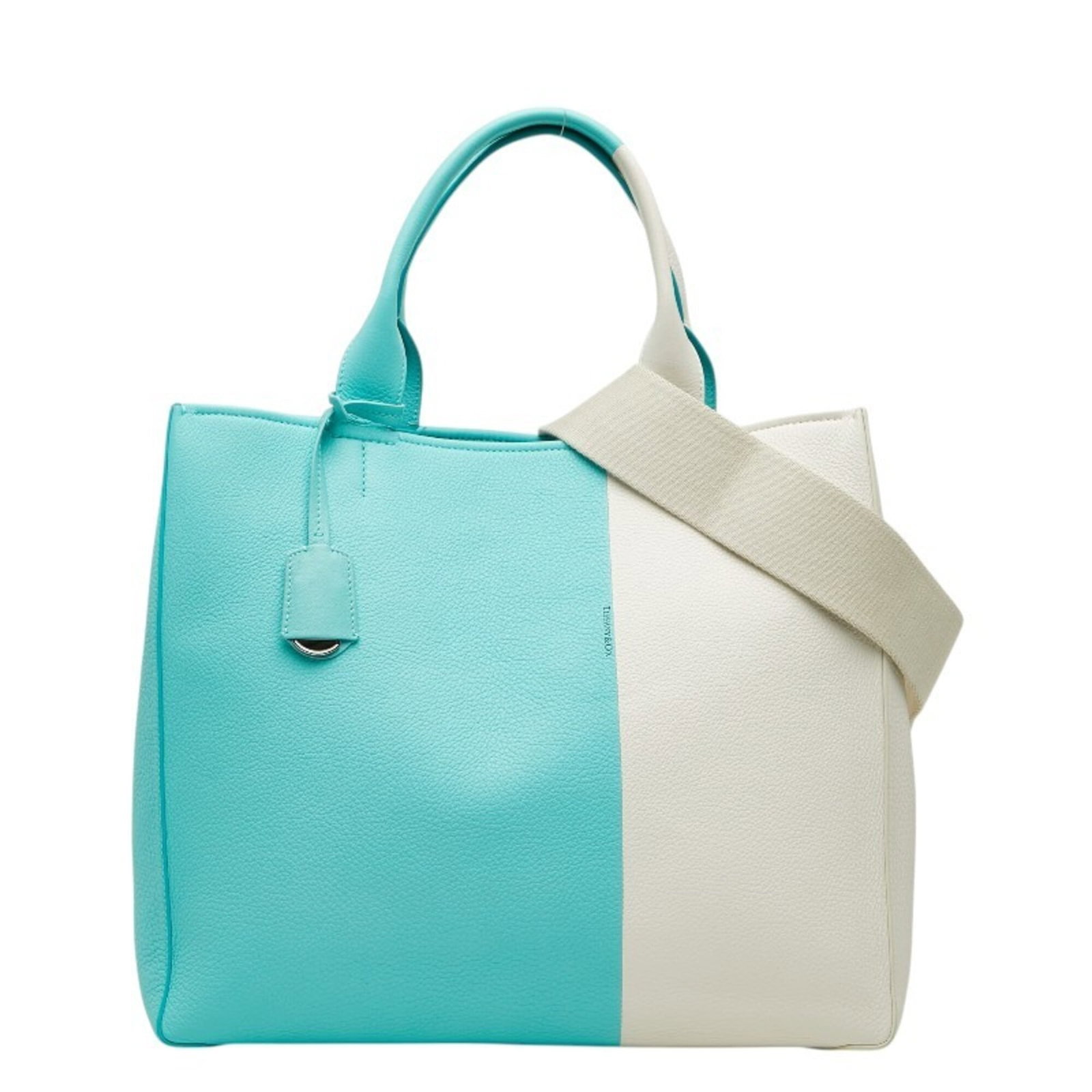 Shoulder Bag Leather Tote Tiffany: Shoulder Bag Leather Tote Tiffany Tiffany blue leather tote bag with clean lines and classic design, featuring a spacious interior and sturdy construction. Made from high-quality leather, this