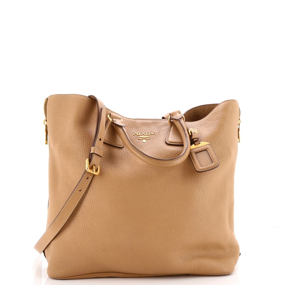Side zip convertible tote prada daino vitello large: Side zip convertible tote prada daino vitello large Side zip convertible tote with neutral exterior and gold hardware, featuring a spacious interior with fabric lining. The Prada Daino Vitello Large