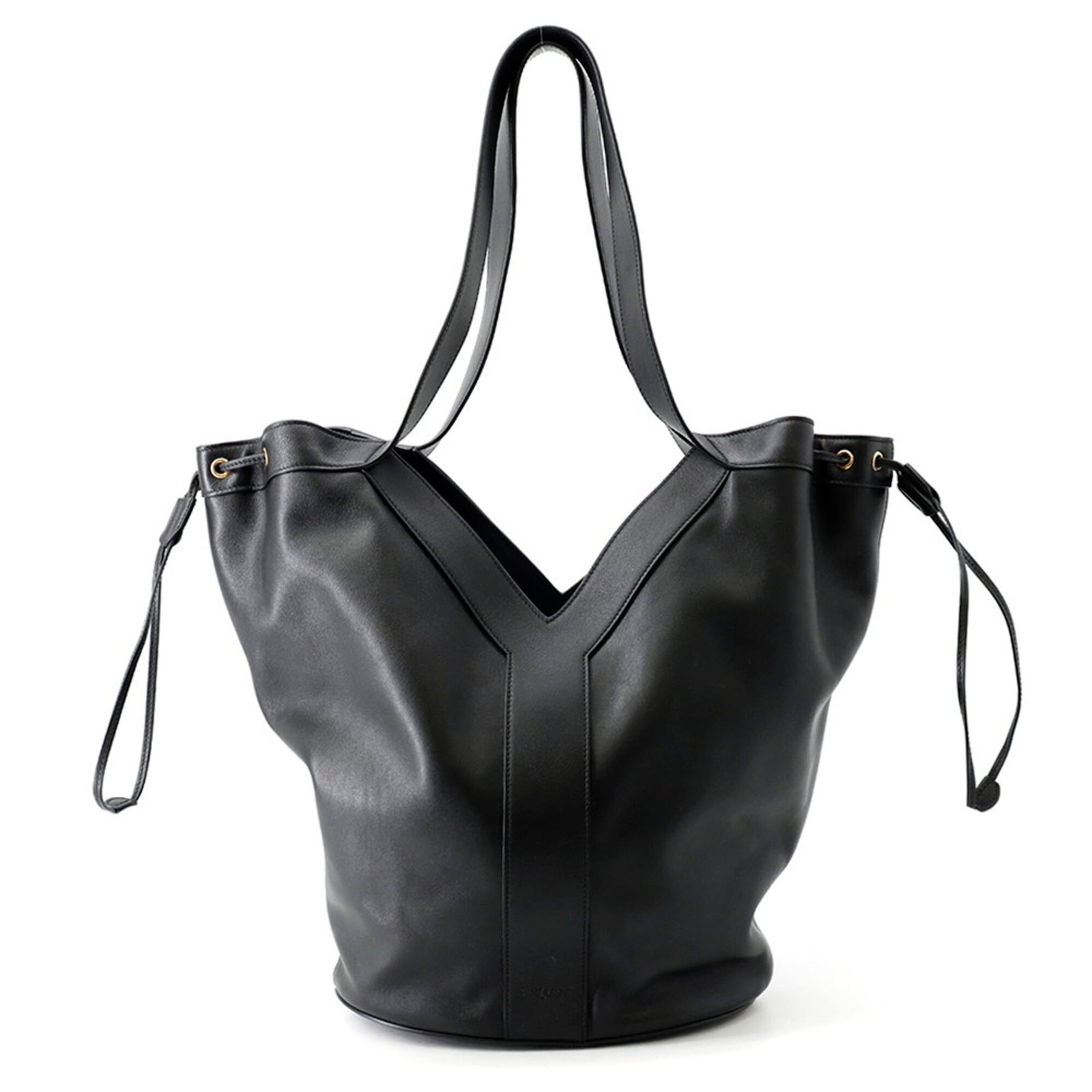Saint Laurent Yves Handbag Leather Tote: Saint Laurent Yves Handbag Leather Tote Black leather tote bag from Yves Saint Laurent, made from high-quality calfskin. Measuring 35cm x 25cm x 15cm, it features a timeless design that exudes