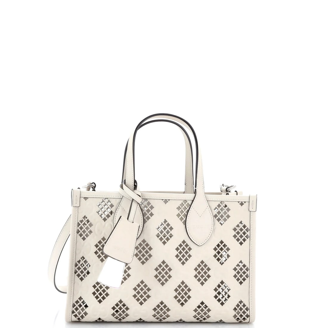 Gucci Ophidia Tote Small Leather GG Laser Cut Debossed: Gucci Ophidia Tote Small Leather GG Laser Cut Debossed Small Gucci Ophidia Tote in Neutral Leather with GG Laser Cut Debossed Exterior, Featuring Scuffs and Edge Wear. This stylish shoulder bag boasts