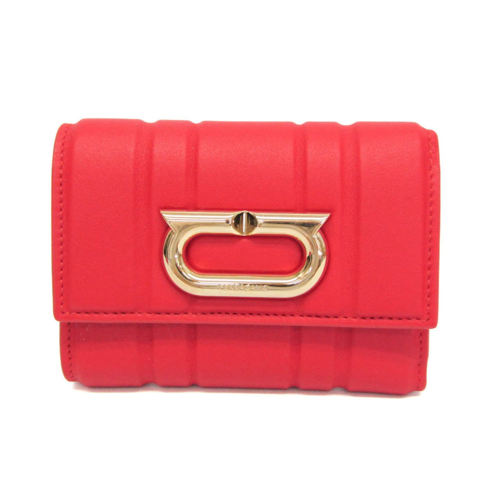Salvatore Ferragamo Wallet (Tri-Fold) Leather: Salvatore Ferragamo Wallet (Tri-Fold) Leather Salvatore Ferragamo's iconic tri-fold wallet features a striking red leather exterior, adorned with the brand's signature style. The wallet boasts