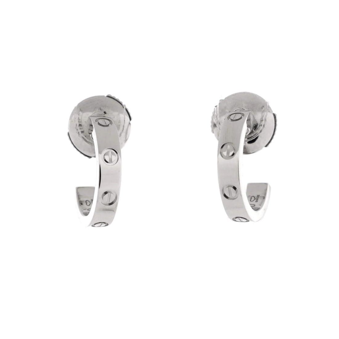 Cartier Love Hoop Earrings 18K White Gold Small: Cartier Love Hoop Earrings 18K White Gold Small 18K White Gold Small Cartier Love Hoop Earrings are crafted from high-quality 18K white gold, featuring a classic hoop design. With their slender