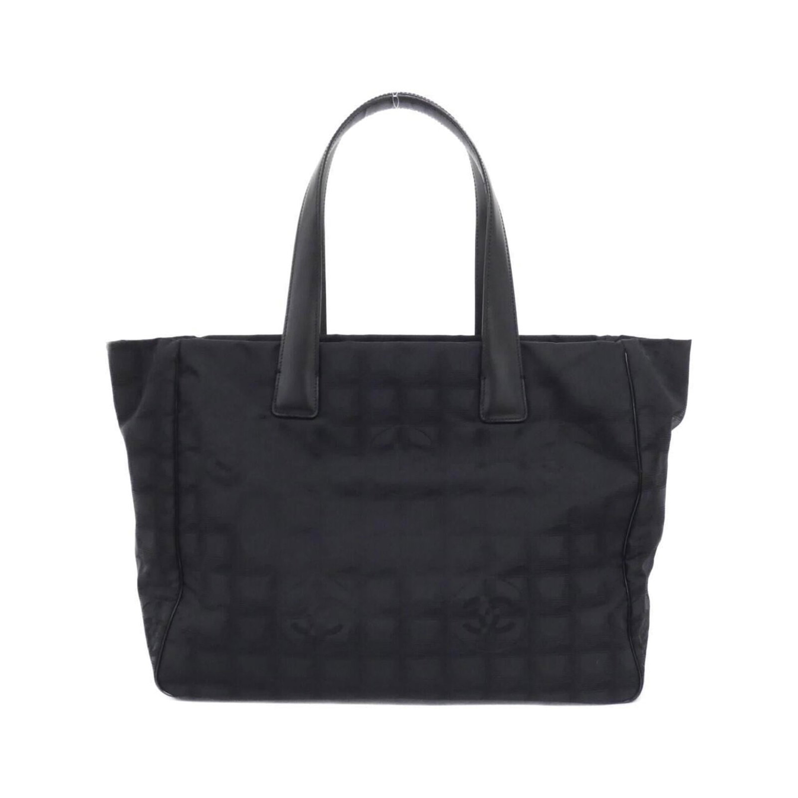 Nylon handbag by Chanel: Nylon handbag by Chanel Nylon handbag by Chanel, featuring a sleek black design with gold hardware, measures 27cm x 35cm x 15cm. Made from high-quality nylon material, this stylish bag boasts a