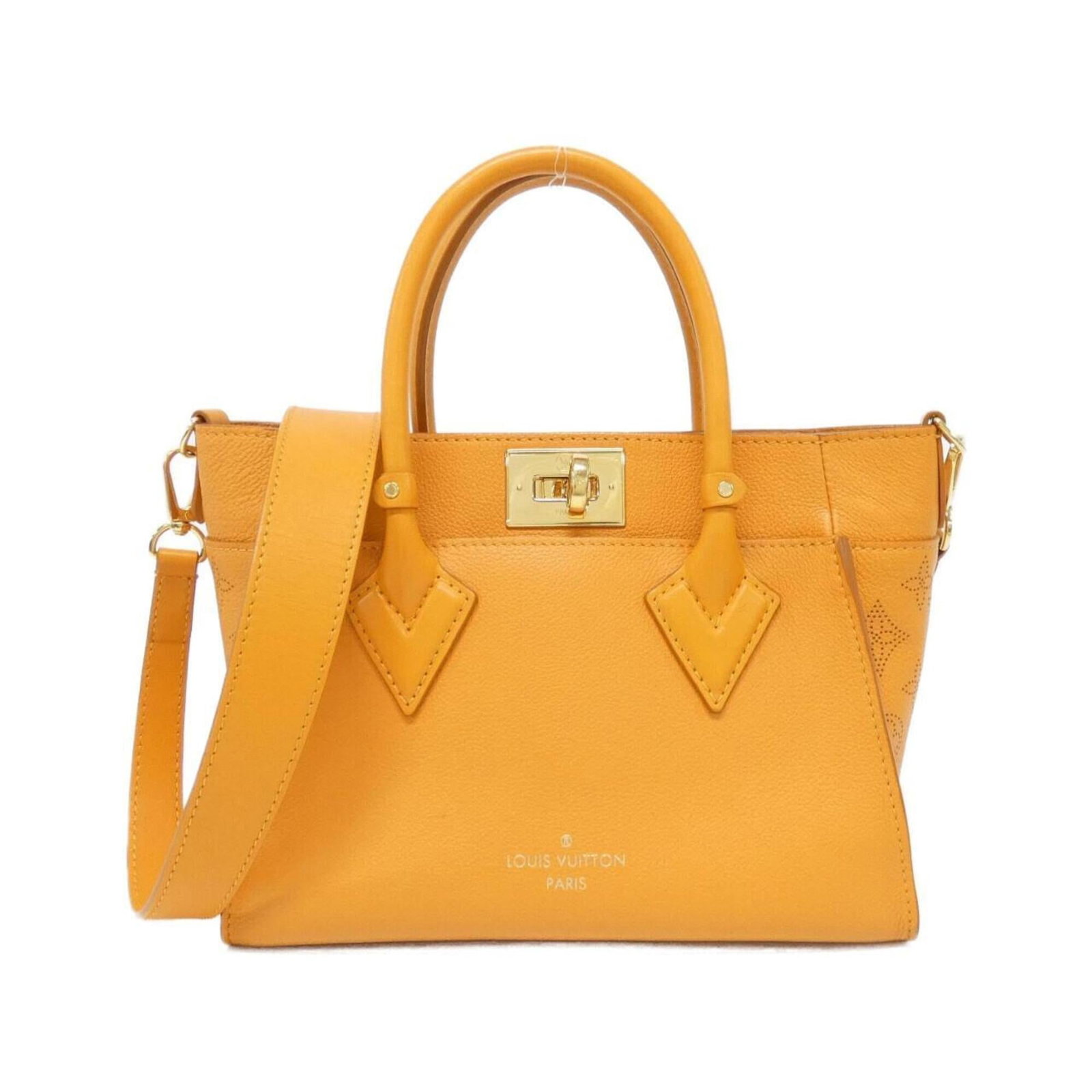 Louis Vuitton Handbag Leather: Louis Vuitton Handbag Leather Louis Vuitton Handbag Leather is made from high-quality Calf leather and features an Orange color with Gold hardware. The bag measures 20cm x 25cm x 12cm, making it a