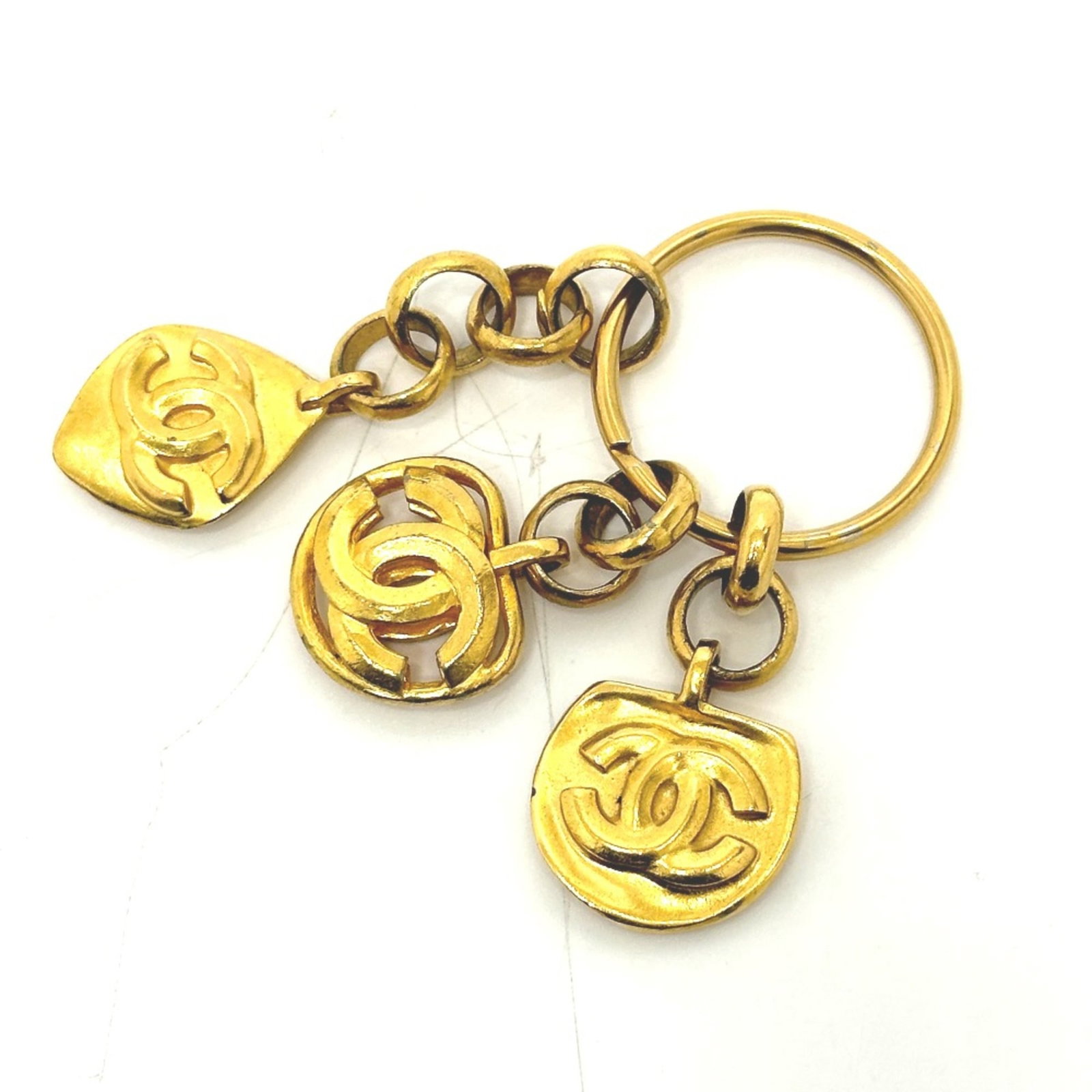 Keyring Gold Plated by Chanel: Keyring Gold Plated by Chanel Gold plated by Chanel, this elegant keyring boasts a luxurious gold finish. With its sleek design and premium materials, it's the perfect accessory for adding a touch of