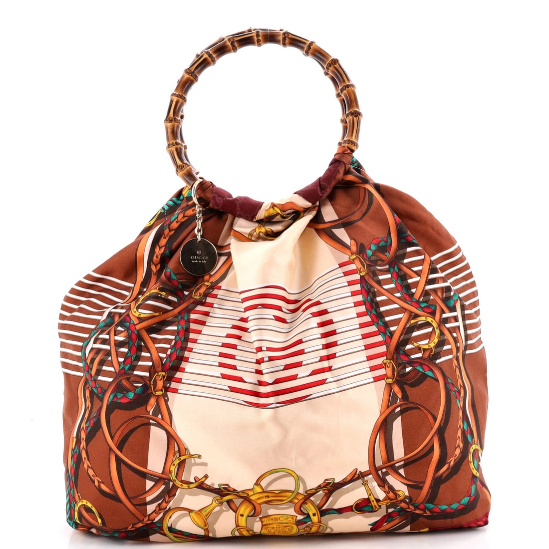 Gucci Bamboo Handle Tote Printed Silk Maxi: Gucci Bamboo Handle Tote Printed Silk Maxi Silk maxi tote with vibrant print, featuring a bamboo handle and gold-tone hardware. This Gucci Bamboo Handle Tote Printed Silk Maxi boasts a unique print de