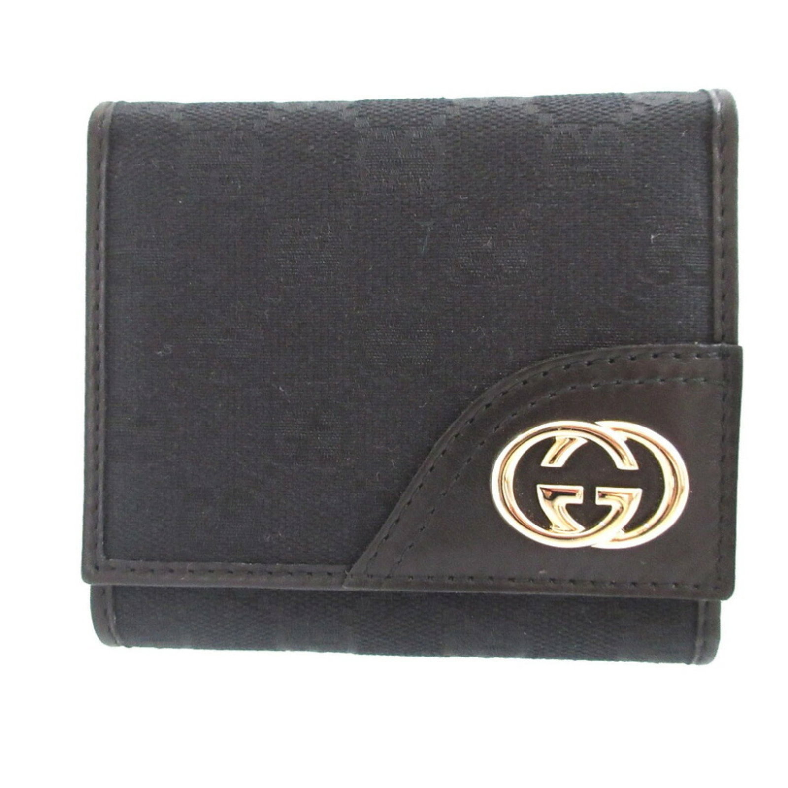Gucci Wallet (Tri-Fold) Gg Canvas Leather: Gucci Wallet (Tri-Fold) Gg Canvas Leather Gucci's iconic tri-fold wallet features a striking black GG canvas leather exterior, adding a touch of sophisticated elegance to any outfit. Made with
