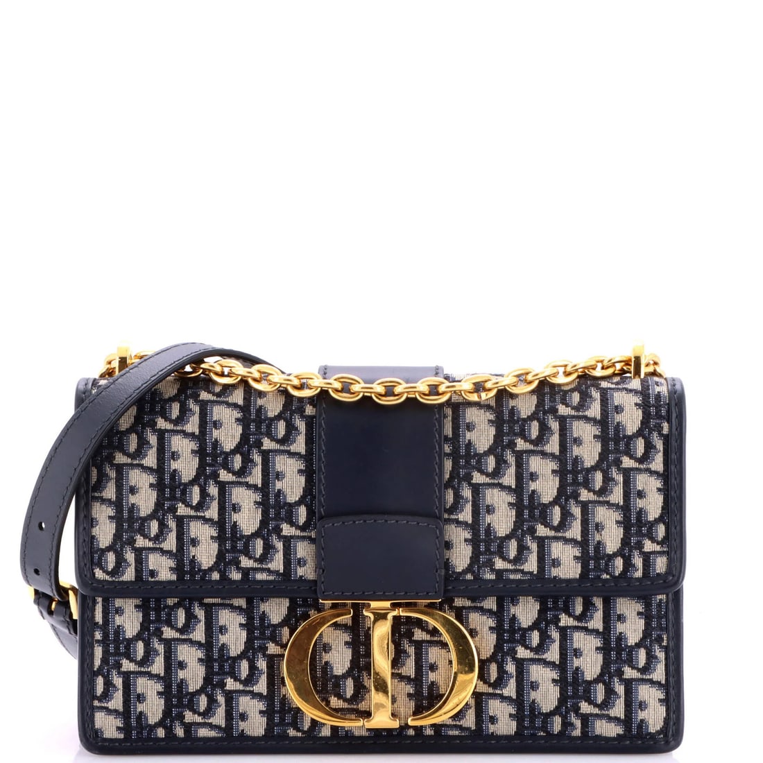 Chain flap bag canvas Oblique Christian Dior Montaigne: Chain flap bag canvas Oblique Christian Dior Montaigne Chain flap bag canvas Oblique Christian Dior Montaigne features a striking blue canvas exterior with gold hardware. The bag's oblique design and