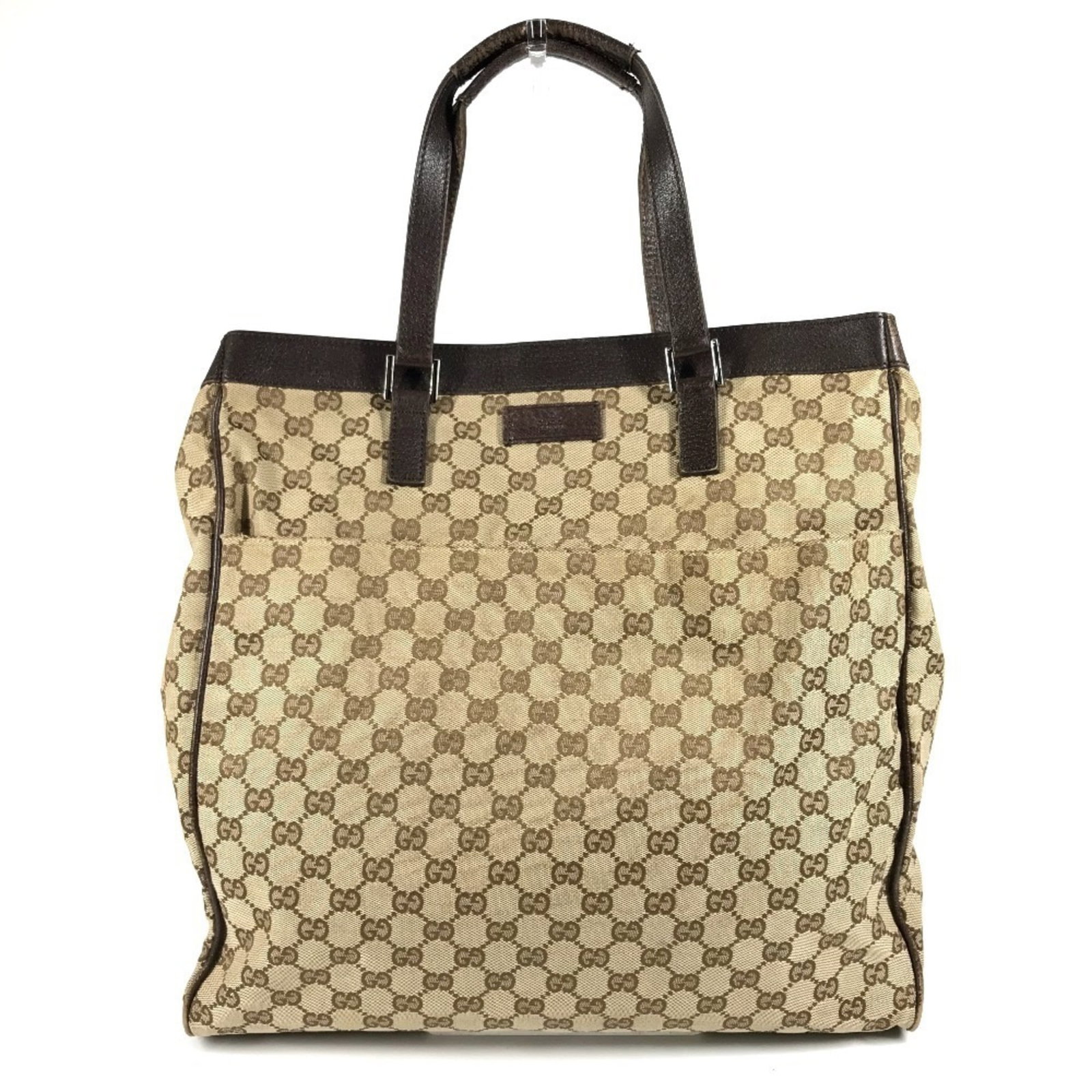 Canvas GG Bag Shoulder Tote Gucci: Canvas GG Bag Shoulder Tote Gucci Gucci's iconic GG canvas bag is presented in a versatile beige and dark brown color combination, featuring the signature interlocking G logo. This shoulder tote
