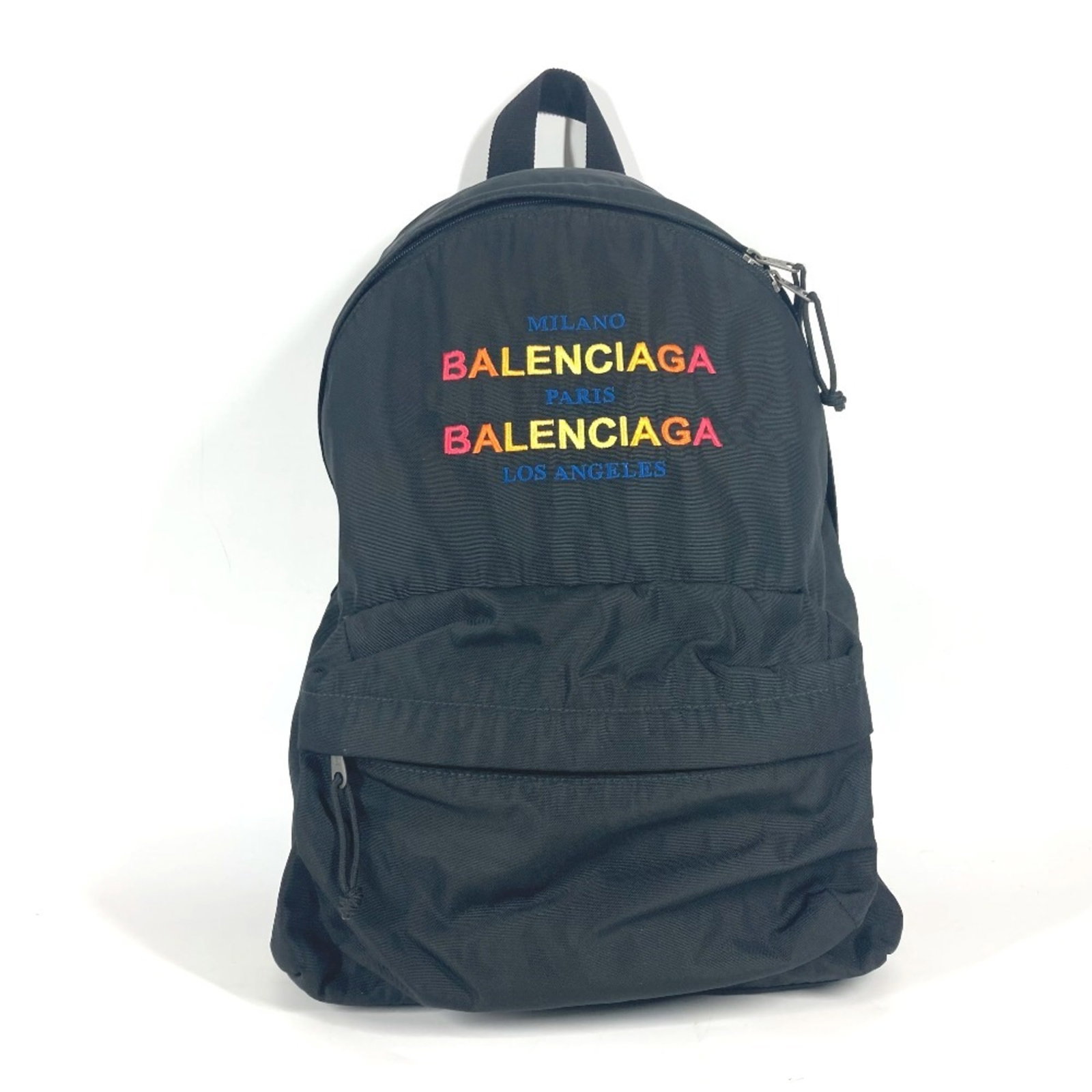 Nylon Backpack By Balenciaga: Nylon Backpack By Balenciaga Balenciaga's Explorer MP backpack boasts a sleek, multi-color design with a sturdy nylon build. The adjustable strap and two zippered pockets provide practical storage opt